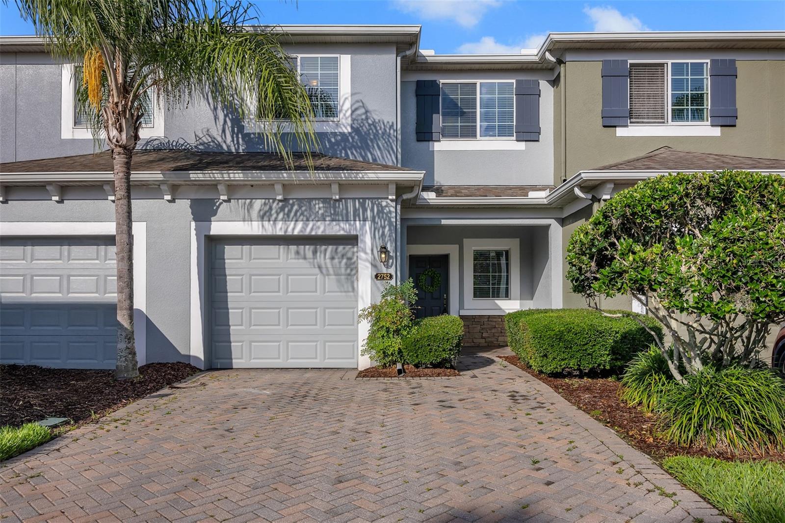 Welcome home to this beautifully maintained two-bedroom townhome with a spacious loft, located in a desirable gated community. Tucked away on the back side of the neighborhood, this residence offers expansive water views that create a peaceful and relaxing setting. The open-concept floor plan is ideal for both everyday living and entertaining. The kitchen is thoughtfully designed with stainless steel appliances, 42-inch cabinetry, and ample counter and storage space. A convenient half bathroom is located on the main level. Large three-panel sliding glass doors lead to the screened lanai, where you can unwind while enjoying tranquil pond and fountain views. Upstairs, the home features a generous primary suite, a secondary bedroom, and two full bathrooms with solid surface countertops and tiled shower walls. The primary bathroom includes a separate shower and a garden tub, a rare and highly desirable feature in a townhome. The upstairs loft provides outstanding flexibility and can easily serve as a second living area, home office, playroom, or media space. The home has been freshly painted in a neutral color palette and includes a paver two-car driveway with a one-car garage, offering plenty of parking. Designed for comfort and energy efficiency, this Energy Star certified home features concrete block construction with foam insulation between units on both floors, a radiant roof barrier, and an impressive HERS rating of 68, helping to keep electric bills low. Residents enjoy resort-style community amenities including a swimming pool, cabana, playground, and a private gated entrance with direct access to the Sanford SunRail station, making commuting simple and convenient. Ideally located near historic downtown Sanford, Seminole Towne Center shopping and dining, Lake Monroe, Central Florida Zoo, and with easy access to I-4, 417, 429, and 1792. The home is also zoned for highly rated Seminole County public schools. This property offers the perfect blend of comfort, efficiency, convenience, and lifestyle in a prime Sanford location.