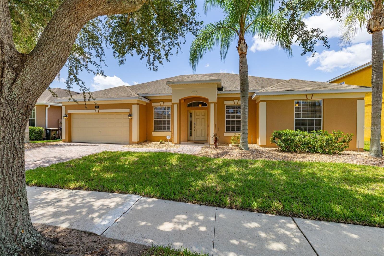 Welcome to this beautifully maintained 2,196 sq. ft. Cape Coral model, offering 5 bedrooms and 3 bathrooms, ideally positioned on one of Watersong Resort's premier homesites. Enjoy breathtaking water and conservation views from an oversized 70-foot homesite, significantly larger than the standard 50-foot lots found throughout much of the community. Located within the Preserve section of Watersong, these premium homesites offer enhanced privacy, generous outdoor space, and stunning natural surroundings.

This fully furnished home has been meticulously maintained and is offered turnkey, making it the perfect primary residence, second home, or successful short-term vacation rental. The private screened pool and spa overlook peaceful conservation and water views, while the west-facing pool deck and covered lanai provide the perfect setting to relax and enjoy Florida's spectacular sunsets.

Inside, you'll find a spacious, open-concept floor plan featuring a well-appointed kitchen, generous bedroom sizes, and a beautifully appointed living room with expansive windows and sliding glass doors that frame the pool and tranquil water views. The remodeled games room provides the perfect space for family fun and guest entertainment. If you're looking for a property where all the hard work has already been done, this home is truly move-in and rental ready.

Recent improvements include:

New HVAC system (2025)
New pool pump (2025)
New refrigerator and range (2024)
New washer and dryer (2024)
Luxury Vinyl Plank flooring throughout the entire floor plan (2022)
Fresh interior and exterior paint (2023)
New king bedroom furniture (2023)
New queen bedroom furniture (2024)
New living room sofa, loveseat, and chair (2025)
Beautifully remodeled games room (2024)
Gas pool heater replaced (2021)

Located within the gated Watersong Resort, residents and guests enjoy outstanding amenities including a clubhouse, fitness center, business center, resort-style zero-entry community pool, playground, and beautifully maintained grounds. The HOA offers exceptional value by providing lawn and shrub maintenance, valet trash service, cable TV, high-speed internet, maintenance of the community's common areas, and a wide range of resort amenities, allowing owners to enjoy a low-maintenance lifestyle. Golf enthusiasts will also appreciate the close proximity to Providence Golf Club.

For investors, this property presents an outstanding opportunity with future bookings already in place, providing immediate rental income potential. A reputable local management company is also available for a seamless transition. Alternatively, for those searching for a permanent residence or Florida retreat, this spacious floor plan, oversized lot, and exceptional outdoor living space combine to offer the very best of the Florida lifestyle. Easy to show. Schedule your private viewing today!