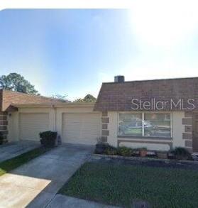 Welcome to this well-maintained 1 BR, 1 1/2 BA Villa with a versatile bonus room and attached garage, located in the 55+ Community of Vendome Village. Built in 1972. This home has been thoughtfully updated with a new garage roof (2025), new Condo roof (2016), A/C replaced in 2018, new refrigerator/stove (2025) and newer Washer/Dryer. Ideally situated directly across from the Recreation Center and pool. You will enjoy convenient access to Community amenities, while still having a peaceful place to relax at home. The location is just minutes from shopping, dining and public transportation, making everyday living easy and accessible. Don't miss this opportunity-this is a must see!