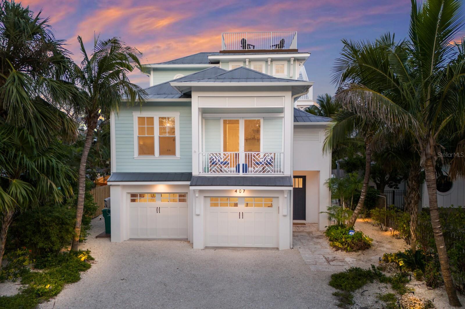The Captivating Luxury Listing! 

Experience the epitome of island luxury at this custom-built masterpiece on the North end of Anna Maria Island. Nestled on the coveted, historic Pine Avenue, this stunning 4-bedroom, 4.5-bathroom residence, completed in 2018, offers an unparalleled blend of sophistication and coastal charm.  

Step inside the main home to discover a beautifully designed interior with an elevator for effortless access to all levels. The home flows seamlessly into a private backyard oasis, an entertainer's dream. Here, you'll find a heated saltwater pool and spa, a cozy gas fireplace, a covered patio perfect for al fresco dining, and a convenient outdoor private shower that is also plumbed to finish out as a full bathroom.  You will enjoy the Pool Room under AC off of the pool to gather for family game night or even make an office!

The unique casita, a separate 4th bedroom, provides a private retreat for guests, complete with its own wet bar, fridge, and en suite bathroom. Multiple patios and a spectacular rooftop deck offer breathtaking views of both sunrise and sunset—a perfect spot for morning coffee or evening cocktails. 

 This is more than a home; it’s a versatile investment. Zoned for 1-7 day rentals and the unique ROR (Residential, Office, Retail) designation, this property presents an incredible opportunity for a luxury vacation rental or even a wellness spa. Sold completely turnkey furnished with high-end fixtures and finishes, this island paradise is ready to welcome its new owner - Call today for your private showing!