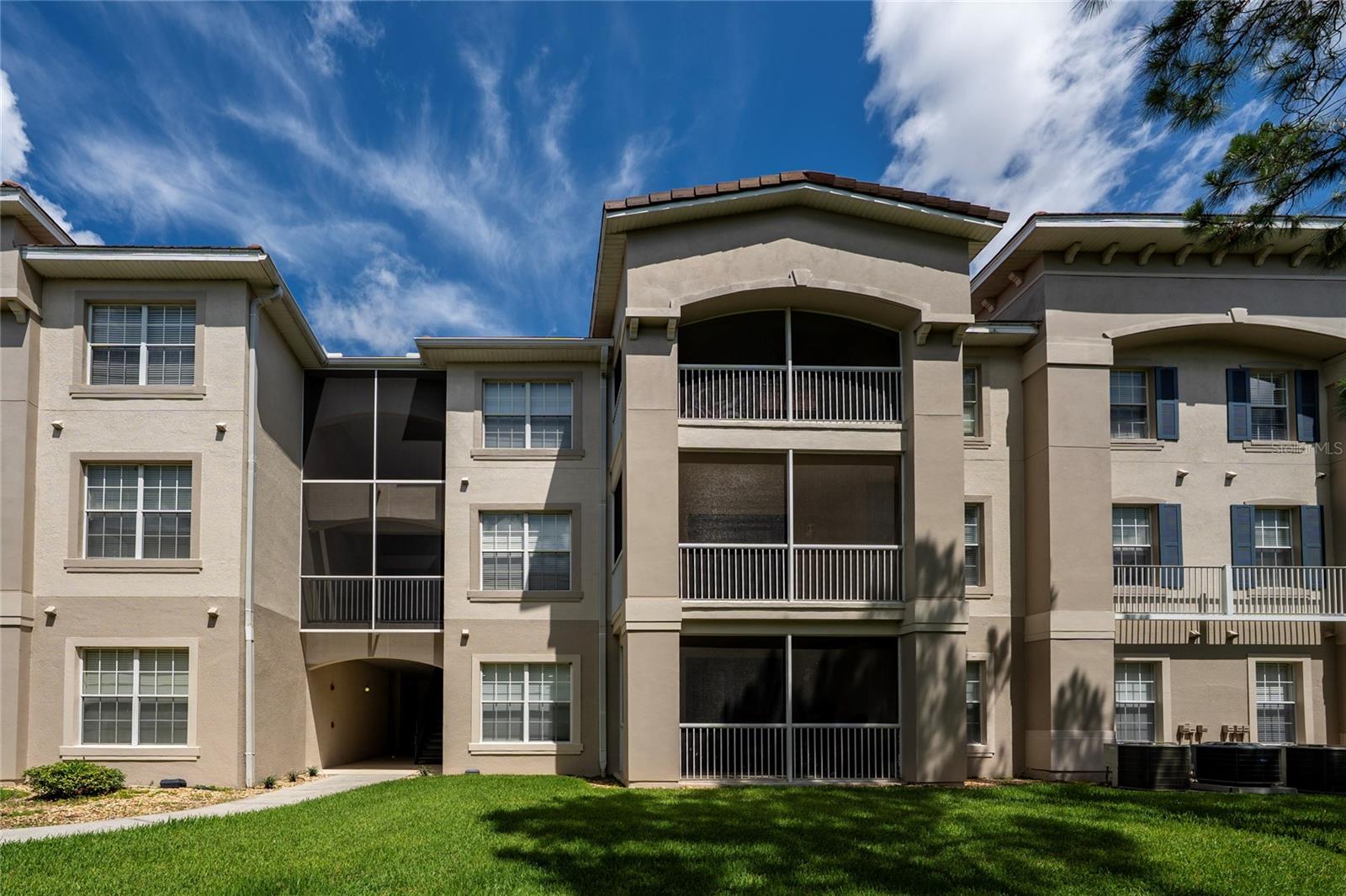 Welcome to this beautifully updated 3 bedroom, 2 bathroom condominium located in the highly desirable gated community of Flora Ridge in the heart of Kissimmee. Situated in the first building of the community with convenient elevator access, this second floor residence offers 1,433 square feet of comfortable living space designed for both everyday living and entertaining. The open concept floor plan seamlessly connects the living, dining, and kitchen areas, creating a bright and inviting atmosphere.
Recent upgrades provide exceptional value and peace of mind, including a new AC system installed in 2025, water heater replaced in 2025, stove replaced in 2025, dryer replaced in 2025, and modern light fixtures installed throughout the entire home. The condo features beautiful laminate flooring throughout, creating a clean and contemporary look with no carpet. Freshly painted in June 2026, this home is truly move in ready.
The spacious primary suite offers a private en suite bathroom, while the additional bedrooms provide flexibility for family, guests, or a home office. Residents enjoy access to community amenities including a swimming pool, fitness center, and beautifully maintained grounds.
Ideally located just minutes from The Loop, major shopping centers, restaurants, medical facilities, schools, Orlando International Airport, world famous attractions, and major highways, this property offers the perfect combination of comfort, convenience, and lifestyle. Whether you are searching for a primary residence, vacation home, or investment opportunity, this meticulously maintained condo is a must see.