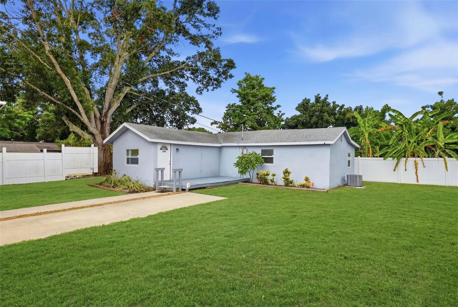 Welcome to 4978 71st street North.  Your search is over!  With just under a quarter acre lot, this property allows for plenty of parking. Since it is unincorporated you're welcome to park boats, RV's, and 2 car concrete driveway included. Huge shed for ample storage and this 3- bedroom 2- bath allows plenty of room for a family, office and guest rooms. Some of Florida's best beaches are 15 minutes away. Grocery stores, restaurants, car wash and coffee are all within a couple minutes drive! Public schools are close by. NO prior flooding, NO HOA or community development taxes! The county just put in a beautiful wide sidewalk in front of this home. Widening of this street is in the process as well. White vinyl fence surrounds the entire property and a push gate is installed that can be slid across the drive way. Ultimate privacy and safety while at home or away on vacation. Plenty of room for BBQ'S and family get togethers, the options with this property are endless!