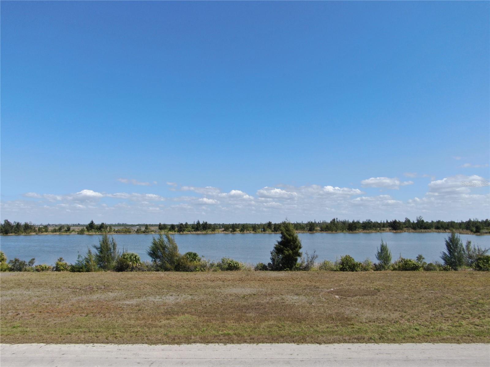 Beautiful waterfront lot located in the growing community of Rotonda Meadows and Villas. Property offers privacy from main roads and businesses, but convenient access to beaches, golf courses, fishing, restaurants, and shopping. The lot is also less than 30 minutes from i75 and conveniently located between Ft Myers Airport and Tampa Airport (Punta Gorda and Sarasota airports are even closer). Enjoy living in paradise and the best SWFL has to offer.