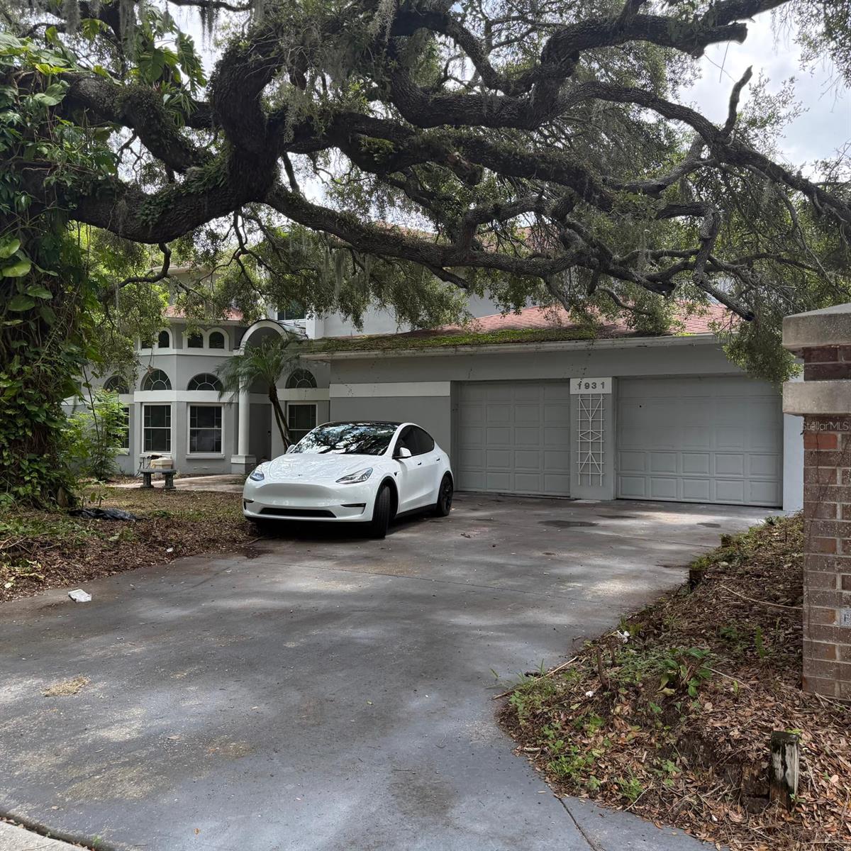 Spacious 5-bedroom, 5-bath residence offering nearly 4,000 square feet of living space on a beautifully landscaped 0.54-acre lot in Clearwater. The two-story floor plan features expansive living areas, high ceilings, a well-appointed kitchen, and a wood-burning fireplace. The primary suite includes a walk-in closet and a luxurious en-suite bath. Enjoy a private backyard with a pool and mature landscaping, ideal for entertaining or relaxing. An attached two-car garage adds convenience. Ideally located near Safety Harbor, Gulf beaches, parks, shopping, dining, and major roadways, this home offers exceptional space, privacy, and access to the best of the Tampa Bay area.