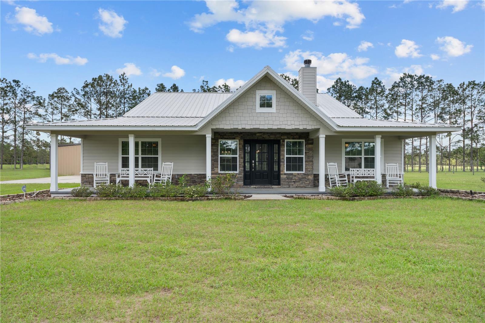 Escape to the untamed beauty of Circle M Ranch, where 391 acres of North Florida’s finest terrain become your personal playground. This isn't just a property, it’s an invitation to a life lived outdoors. Wake up to the call of wild turkey and track trophy deer through 80 acres of majestic riverfront hardwoods.
With over 3,760 feet of private frontage on the spring-fed Santa Fe River, your afternoons are spent launching from your private boat landing or casting into pristine waters. Across the river, protected lands ensure your silence is never broken. Whether you’re managing the existing cattle pastures or exploring the expansive woodlands, this is the ultimate sanctuary for those who demand both adventure and absolute privacy.
The estate is fully equipped for your vision, featuring a gorgeous home, a 30’x25’ barn, and a 40’x40’ workshop supported by a 6” well for all agricultural needs.
Disclaimer: All measurements, acreages, and river frontage footage are approximate. Buyer is advised to verify all information, including but not limited to land dimensions and water frontage, through a personal inspection and/or with appropriate professionals.