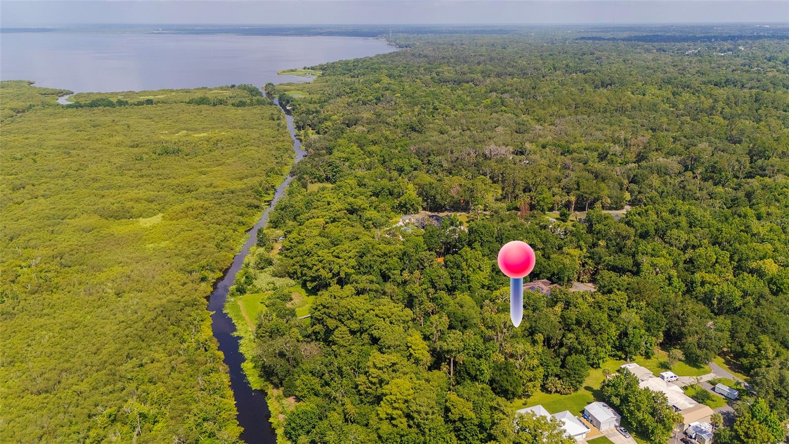 Build your dream home on this rare, 1-acre lot offering the perfect blend of privacy, adventure, and convenience! This uncleared parcel is a blank canvas waiting for your custom architectural vision, complete with plenty of space for your RV, watercraft, and even potential zoning for horses. Water enthusiasts will love the community common area, which features a private boat ramp with canal access leading directly to Lake Monroe and the historic St. Johns River--the only river in Florida that flows north. Surrounded by the ultimate outdoor lifestyle, you are just minutes from scenic running and cycling trails, Mariners Cove Park, Green Springs Park, and Thornby Park. Despite the peaceful, natural setting, you are perfectly positioned for easy commuting and weekend getaways. The property is located within 5 miles of I-4, 15 miles of premier shopping and dining in Sanford and Lake Mary, and within 30 to 35 miles of both New Smyrna and Daytona Beach. Don't miss this incredible opportunity to design your ideal lifestyle from the ground up! *All information intended to be accurate but should be independently verified.*