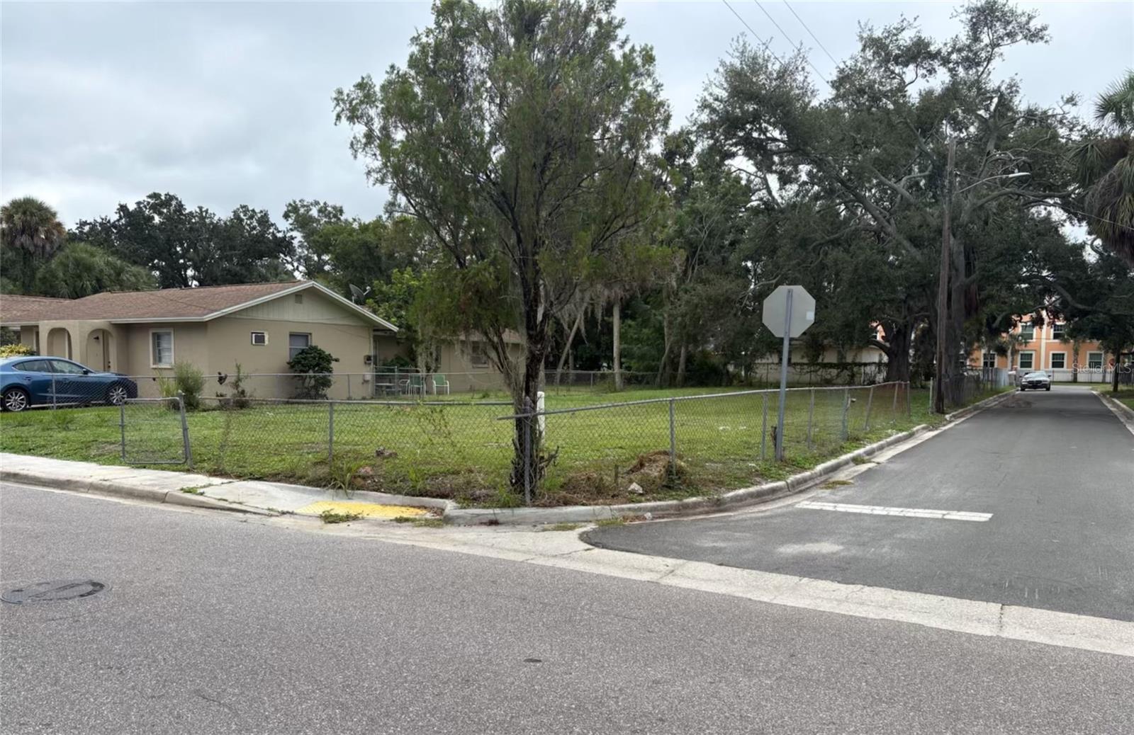 Build your dream home on this large corner lot in central Sarasota, just minutes from downtown, world-class dining, arts, and Sarasota’s beautiful beaches. Zoned RSF-4 with public water, sewer, and electric service available, this property offers an excellent opportunity to build a custom single-family residence in a centrally located Sarasota neighborhood. The corner lot setting provides flexibility for home design, added privacy, and strong curb appeal, with ample room for outdoor living, a garage, and a pool. RSF-4 zoning allows a single-family home, and buyers may explore the possibility of an accessory dwelling or mother-in-law suite subject to city approval. The property is not located in a flood zone (Flood Zone X), has no HOA, and offers convenient access to shopping, restaurants, schools, and cultural attractions. Buyer to verify all building requirements.
