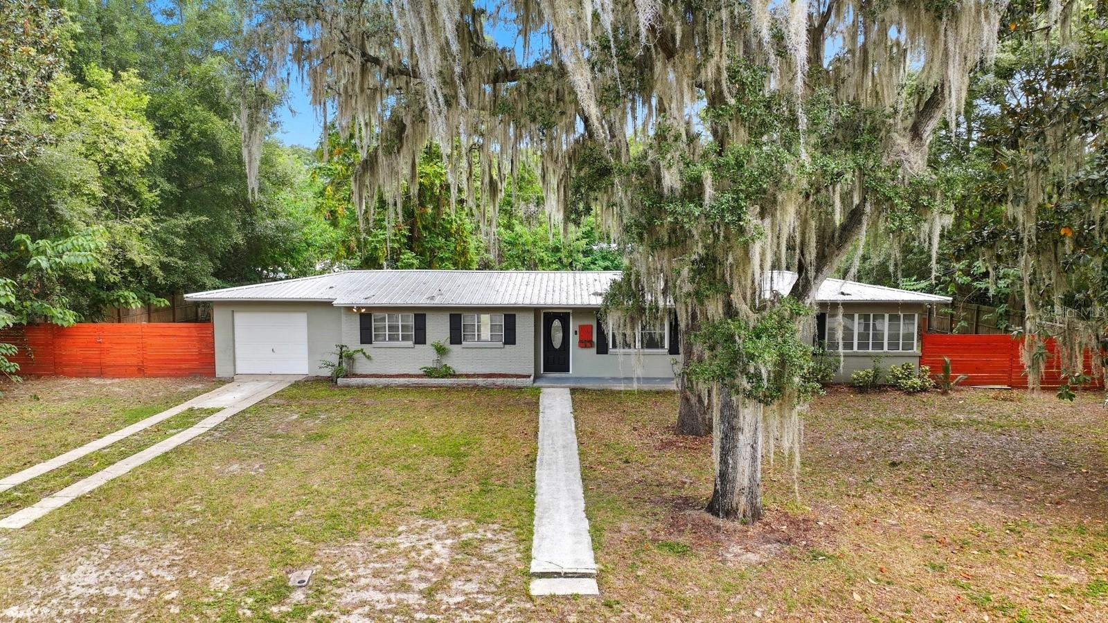 One or more photo(s) has been virtually staged. Welcome to easy Florida living just a short stroll from the sandy shoreline of Lake Geneva. This charming 3 bed, 2 bath, 1,472 sq ft home sits on an oversized, tree-shaded lot on a quiet street—perfect for morning walks and backyard play. Inside, you’ll love the large, open living spaces, upgraded bathrooms, and a one-car extended garage for extra storage and/or a workshop.
Step outside and the lifestyle really shines. Pop over to Keystone Beach/Geneva Jungle for swims, picnics, and playground time, or launch a day of boating and fishing on Lake Geneva’s waters. Walking distance to Keystone Heights Elementary and Keystone Heights High School. The Palatka-to-Lake Butler State Trail offers miles of paved biking and walking just minutes away, and you’re about 25–35 minutes to Gainesville for work, Gator games, and city amenities. It’s the laid-back, small-town pace with big-time outdoor fun Florida families love—right where you live. Square footage received from tax rolls. All information recorded in the MLS intended to be accurate but cannot be guaranteed.