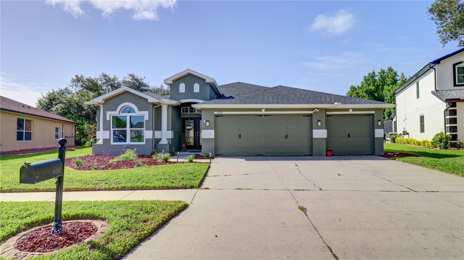 Welcome to this beautifully maintained 4-bedroom, 3-bathroom pool home with a dedicated den/home office in the highly sought-after Dupree Lakes community of Land O' Lakes. Offering 2,665 square feet of thoughtfully designed living space, this move-in-ready home combines modern upgrades, spacious living, and an incredible backyard oasis. There's plenty of room for all your toys in the 3 car garage which features a pull down tinted garage screen and epoxy floors.

Inside, you'll find soaring ceilings, abundant natural light, and an open floor plan that's perfect for everyday living and entertaining. The spacious kitchen overlooks the main living areas, while a private guest suite with its own full bath offers ideal accommodations for visitors or multi-generational living. The primary suite features dual walk-in closets and an upgraded walk-in shower.

Major updates include a new roof (2025), fresh exterior paint (2025), energy-efficient windows (2021), a screened saltwater pool and spa (2022), and a custom patio (2026). The leased solar system helps lower monthly electric costs, with the buyer assuming the current lease.

Step outside to enjoy your private backyard retreat, complete with the pool and spa, an expansive patio, and six raised garden beds.

Residents of Dupree Lakes enjoy resort-style amenities, including a clubhouse, pool, playgrounds, parks, walking trails, basketball and tennis courts, all conveniently located near top-rated schools, shopping, dining, and major highways.

Don't miss your opportunity to own this exceptional home that truly offers the best of Florida living. Schedule your private showing today!
