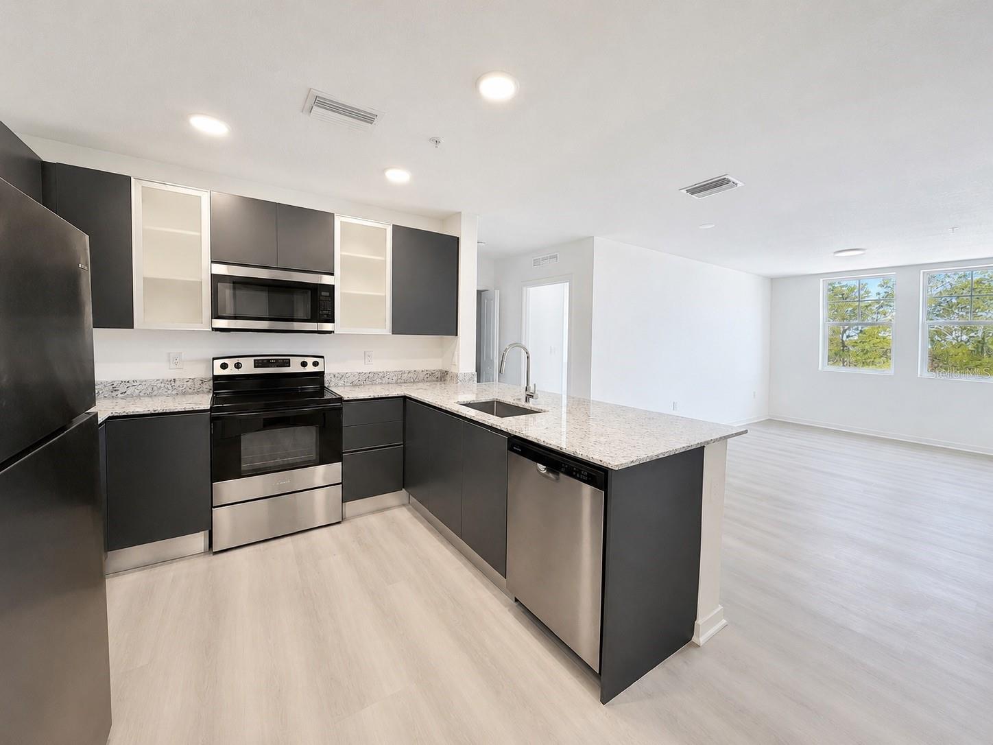 Be the first to live in this brand-new apartment in the heart of Millenia! Located on the third floor, this stunning residence offers 2 bedrooms, 2 bathrooms, plus a separate office or bonus room—perfect for working from home, studying, or creating additional flexible living space.

Featuring 1,023 square feet of newly built living space (2025), this concrete construction provides enhanced privacy, durability, and superior sound insulation. The modern open-concept design is filled with natural light and complemented by beautiful views.

Residents enjoy resort-style amenities including a swimming pool, fully equipped fitness center, tennis courts, playground, elegant social areas, two assigned parking spaces per unit, and a convenient trash chute located on the same floor.

Ideally situated just minutes from The Mall at Millenia, premier dining, shopping, and with easy access to Orlando's major highways and attractions.

Pet-friendly and move-in ready. Schedule your private tour today and make this exceptional residence your new home.