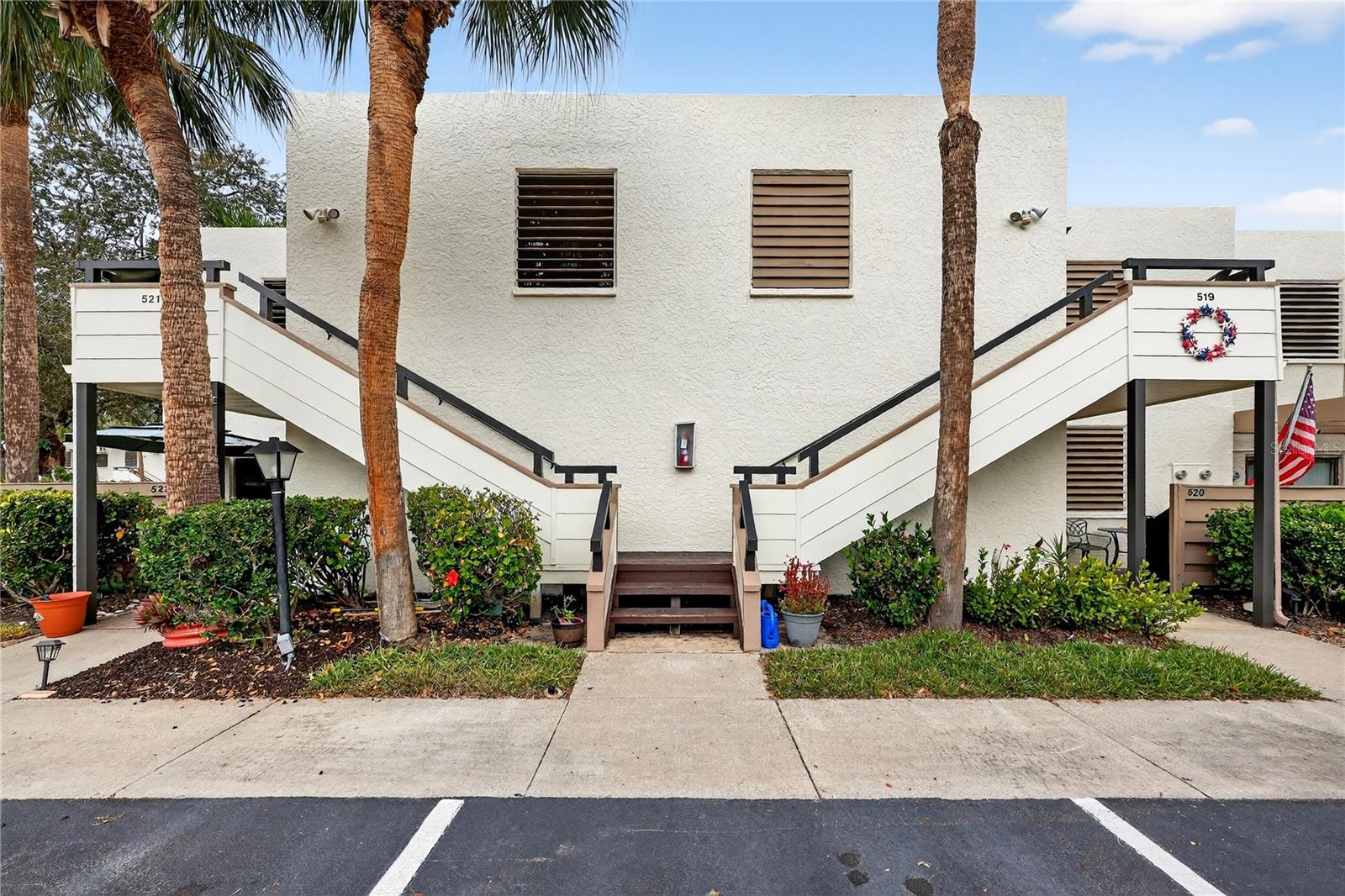 Welcome to your turn-key furnished Florida retreat in the serene, sought-after community of Wildewood Springs. This beautifully updated second-floor residence offers the perfect seasonal escape, allowing you to arrive, unpack, and immediately start enjoying the laid-back coastal lifestyle. Light-filled living spaces and an open layout create a warm, inviting atmosphere, while the well-appointed kitchen makes it easy to entertain family and friends during your winter stay. You will instantly notice the exterior fresh coat of paint when you arrive.  The split bedroom floor plan provides ideal privacy for visiting guests, and the spacious lanai with soft vinyl windows that are also screened to let the breeze come through becomes your favorite place to relax—surrounded by lush greenery and the sights and sounds of native birds and wildlife. As a recognized bird and wildlife sanctuary, Wildewood Springs offers peaceful walking paths, mature trees, and a true resort-style setting. Residents enjoy heated swimming pools, tennis and pickleball courts, and a welcoming, active community that comes alive during the season. Ideally located just minutes from IMG Academy, shopping, dining, and the white-sand Gulf beaches, this home delivers the ultimate lock-and-leave lifestyle. Simply bring your suitcase and start enjoying everything Florida living is meant to be.