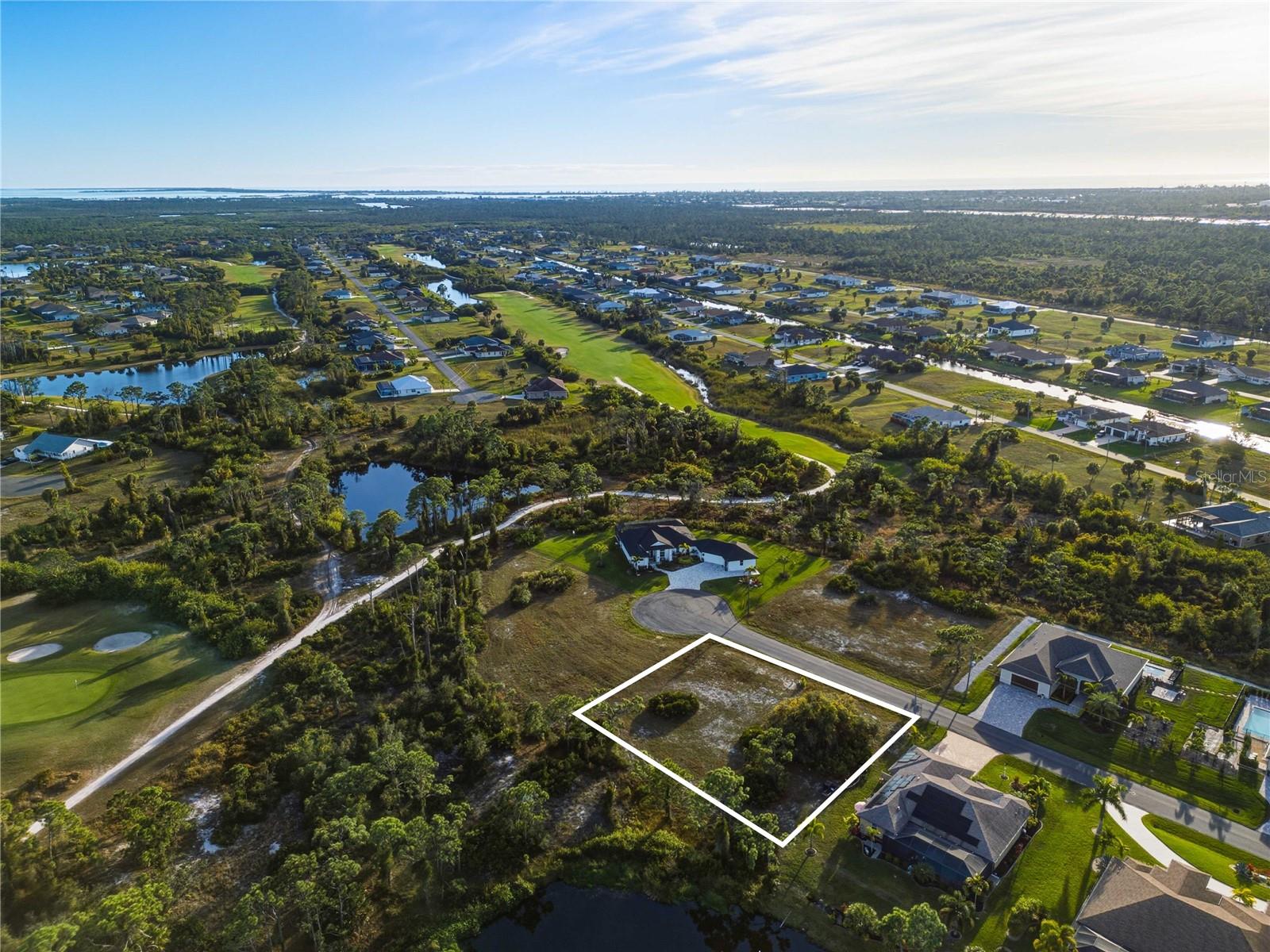 This Double Lot located in a Cul de Sac and on a pond will give you a unique location offering tranquil views of sunrises and the ultimate Florida lifestyle in the desirable Pine Valley neighborhood. Rotonda West is a highly sought-after golfing community featuring 5 golf courses with 99 holes, suitable for all skill levels. Located on the scenic Cape Haze Peninsula, the area offers a perfect balance of nature and convenience, with nearby restaurants, boutiques, and two community parks featuring tennis courts and playgrounds. Residents enjoy easy access to the Gulf of Mexico and its pristine beaches, including Englewood Beach, Manasota Key, and Boca Grande. Outdoor enthusiasts will appreciate the nearby 8-mile Cape Haze Pioneer Trail, as well as boating, fishing, and the historic charm of Downtown Englewood’s Dearborn Street.