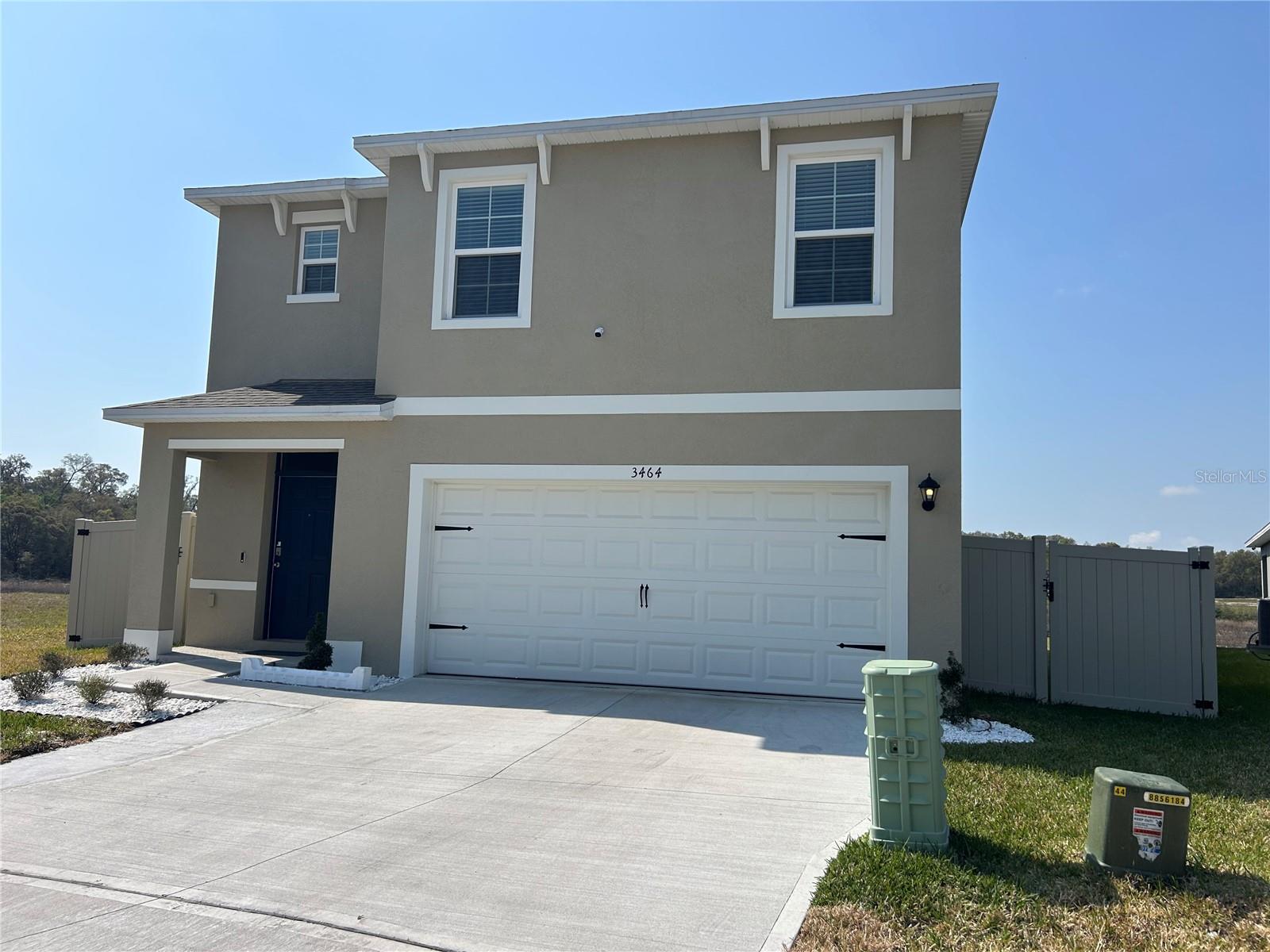 Beautiful 5-bedroom, 3-bathroom home located in the highly desirable Lake Apopka Sound community in Ocoee. This spacious two-story floor plan features an open-concept design with modern finishes, a gourmet kitchen with granite countertops, a center island, smart home technology, and a convenient first-floor guest bedroom with full bath. Upstairs you'll find a versatile loft, a luxurious primary suite, additional bedrooms, and a full-size laundry room. Enjoy a two-car garage, oversized driveway, and resort-style community amenities including a pool, clubhouse, fitness center, playground, walking trails, and dog park. Ideally located just minutes from Winter Garden Village, major highways, and Orlando's world-famous attractions.