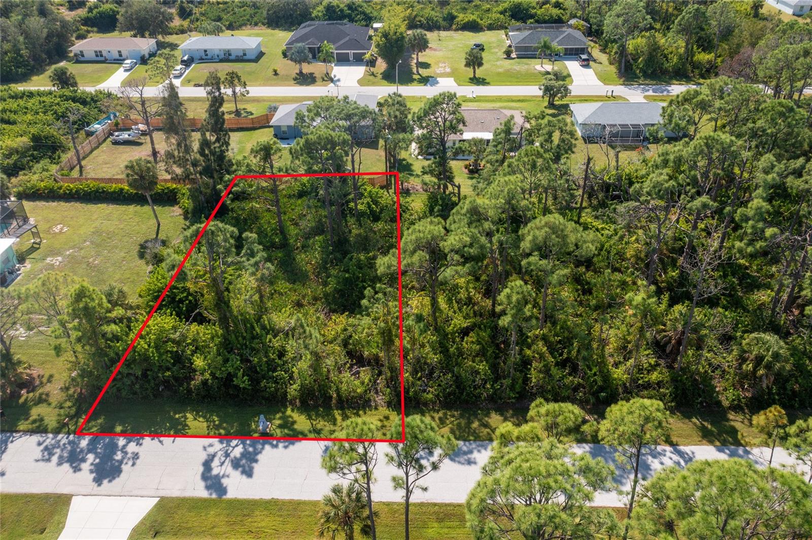 Nice buildable lot in a growing area. Located flood zone X, so no flood insurance will not be required. No deed restrictions or HOA fees. Conveniently located and close to restaurants, golf courses, shopping, and the Gulf beaches are a 15 minute drive.  This parcel of land also is being sold by the same owners of 12020 Newgate (MLS# D6133032) that currently sits on a double lot.