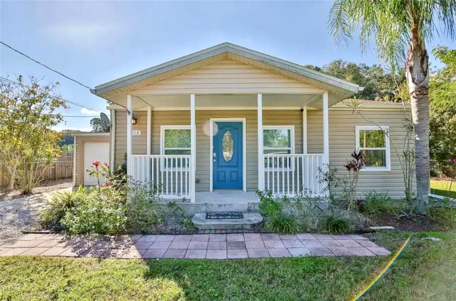 Storybook Charm Meets Modern Luxury in Highly Desirable Arlington Park!

Nestled in the unique, tree-lined "Cottage in the Pines" section of south downtown Sarasota, this beautifully updated 1952 residence perfectly blends timeless mid-century character with smart, modern improvements.

From the moment you arrive, the brand-new vinyl siding and welcoming farmer’s porch create undeniable curb appeal, while the wide stone driveway offers plenty of extra parking. Step inside to discover a bright and spacious 3-bedroom, 2-bathroom, 1,626-sqft floor plan designed for effortless living. Durable tile flooring sweeps through the main living areas, leading to a charming kitchen complete with a closet pantry, custom tile backsplash, and a convenient pass-through window to the dining area.

Safety and efficiency are already taken care of with hurricane-impact windows installed across the front and bedrooms. The expansive primary suite is a true private retreat, boasting an extended sitting area, a large walk-in closet, a remodeled spa-like bath, and private sliding door access to the backyard.

Outside, your personal Florida oasis awaits. The fully fenced, oversized 0.21-acre lot features a relaxing hot tub, a handy utility shed, and endless space to design a future pool or gardening paradise.

Located just minutes from downtown Sarasota, the world-class sands of Siesta Key, Sarasota Memorial Hospital, and the vibrant recreation at Arlington Park, this home offers unparalleled central convenience.

Schedule your private tour today and fall in love!