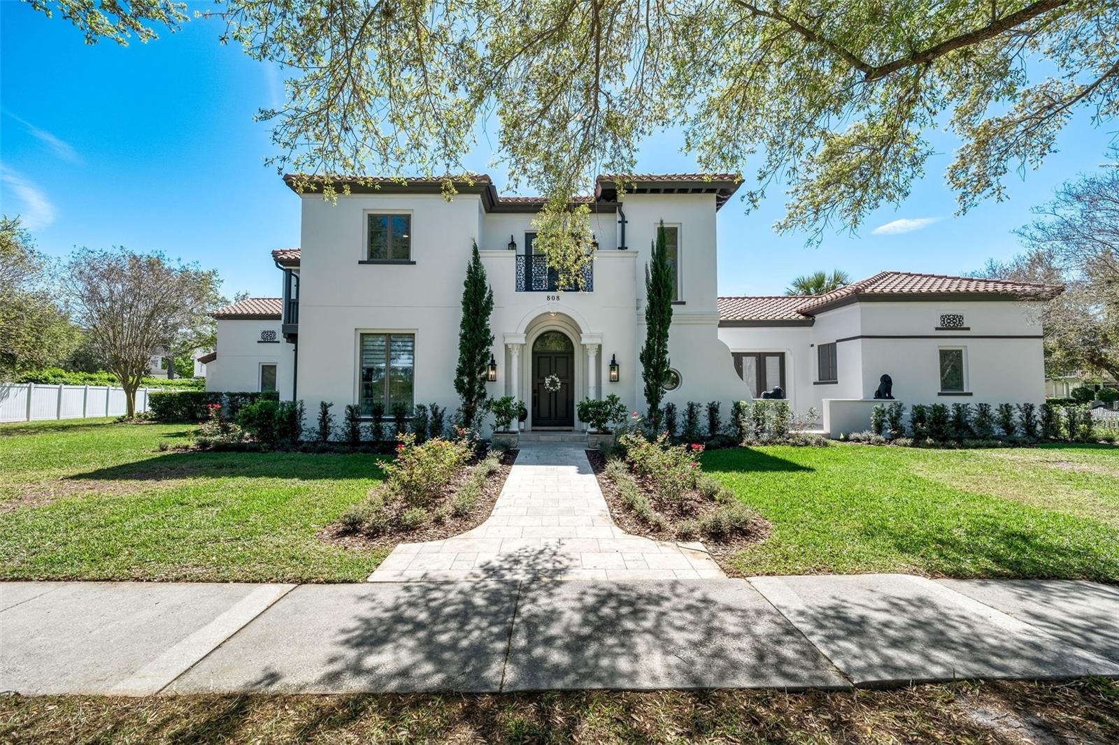 Welcome to 808 Golfpark Drive, nestled in the sought-after "Main Village" and offering picturesque views of the first green at the Celebration, FL-designed Robert Trent Jones Sr. & Jr. golf course. This exquisite luxury estate residence perfectly marries elegance with sophistication, set on a prestigious corner lot.

Spanning 6,493 square feet, this meticulously renovated home presents six spacious bedrooms and six and a half beautifully appointed bathrooms. Upon entry, you're greeted by soaring high ceilings and refined architectural details, including columns, crown moldings, and decorative moldings. The grand curved and spiral staircases enhance the home's opulent atmosphere, while built-in features add both style and functionality.

At the heart of the home is the chef's kitchen, designed for both culinary enthusiasts and entertainers. It features premium counters, a breakfast bar, and a cozy breakfast nook, complemented by Monogram Energy Star stainless steel appliances, including a gas oven and stove, a 48" fridge freezer, and dishwasher. The butler’s pantry and open island kitchen layout make this space an entertainer's dream.

Natural light streams through the home's northeastern exposure, highlighted by elegant chandeliers and recessed lighting. Step outside to your private oasis, complete with a heated below-ground pool, spa, and an inviting patio. The Juliet balcony, private terrace, and barbecue area extend your living space into the serene outdoors.

Modern amenities include central air conditioning and heating, a dedicated laundry room with a washer and dryer, and an attached 3-car garage with 11-foot ceilings, offering the perfect space for potential car lifts. A comprehensive security system provides peace of mind.

Luxury touches abound, with New Zealand wool carpets in the bedrooms, Kohler faucets, and new matte black outlets throughout. With approximately $500,000 invested in renovations—including kitchen upgrades, HVAC and water heater replacements, and extensive interior and exterior updates—this residence offers unparalleled comfort and style.

Experience the pinnacle of luxury living in this extraordinary home, where every detail has been thoughtfully designed for your comfort and enjoyment.

Only a 5-minute stroll to Downtown Celebration where residents enjoy large recreational areas with multiple amenities, a Community Center, over 40 neighborhood parks and more than 26 miles of walking trails. Commercial areas include Downtown Celebration, Shoppes at Celebration Place, The new Celebration Pointe, and Water Tower Shoppes with multiple restaurants and shops.