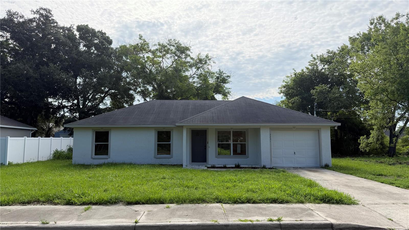Positioned at the end of a quiet, family friendly, dead end street; this, recently renovated, modern home offers: four bedrooms, a split floor plan, vaulted ceilings, good size private yard with mature woodland, new carpets in all bedrooms, luxury vinyl plank in living areas, new stove and fresh paint inside and out. Conveniently located around 30 mins from Orlando, 35 mins to New Smyrna beach, less than 5 mins from Sanford International airport and a short walk to Midway Elementary and Millennium Middle Schools.