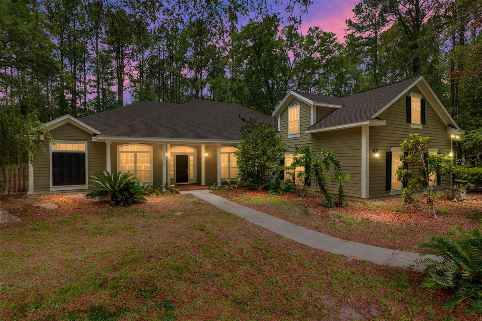 Do not miss your opportunity to purchase this large five-bedroom home sitting on 1.28 acres, ready for your personal touches. The expansive lot features a screened pool, fenced yard, and mature trees with direct access to the community playground through a back gate. A three-car garage provides space for all the sporting equipment and toys, so you can enjoy everything this spacious house, property, and surrounding neighborhood have to offer.

The luxurious owner's suite features a private spa-like bathroom tucked at the end of a dedicated corridor, with a walk-in closet on each side — a jetted tub, double sinks, and a separate shower await. On the opposite end of the suite, French doors open directly to the pool deck for a refreshing evening swim. With high ceilings, natural light, new carpet, and square footage to spare, this owner's suite will be your own oasis — just down the hall from a home office, nursery, or fifth bedroom with built-in shelves.

When it's time to entertain, you can host any event from formal to casual. The large living room off the main entrance is the perfect space for guests to enjoy hors d'oeuvres and conversation, open to the pool deck via another set of French doors, before moving to the formal dining room for dinner. A pocket door separates the main living room from the great room and kitchen, where friends can help prepare a meal in the open kitchen, enjoy a snack at the eat-in bar or dinette, or watch the game while keeping warm by the gas fireplace.

Off the great room, a pocket door opens to a hallway with two large bedrooms separated by one of three full bathrooms. Both bedrooms feature large closets and new ceiling fans — perfect for guests or family who want a bit of privacy from the rest of the house. For those looking for even more privacy, the main hallway leads past the laundry room and garage entrance to a first-floor bedroom and bathroom, both separated from the hall by pocket doors. Or head upstairs to the second floor, which features a massive living space with new carpet, built-in shelving, and a nook perfect for an office, media room, game room, or play area. This large second-floor room also features a half bath and its own AC unit for maximum comfort and energy efficiency.

Step through one of the four glass doors to the pool deck and enjoy space for lounging and dining alongside a safety-fenced, heated pool with a brand-new pump. A dedicated half bath accessible from inside and directly from the pool deck keeps things convenient for swimmers and guests alike. When the pool isn't warm enough, hop into the in-ground spa with its waterfall into the 25+ foot swimming pool.

Recent Updates

New HVAC for main house — March 2020
New dishwasher — February 2022
New roof — December 2022
New kitchen sink, faucet, and disposal — April 2023
New refrigerator — May 2026
New pool pump and filter element — May 2026
New hot water heater — June 2026

The hard work on this house has been done, and it's ready for you. Schedule your tour now — before someone else calls it home.