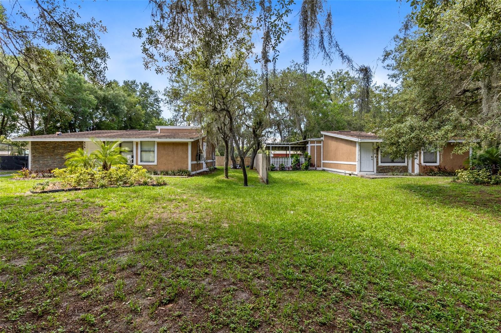Unique commercial and agricultural opportunity on nearly 5 acres in Apopka with infrastructure in place for a variety of business uses. Zoned RCE, this property is well-suited for nursery operations, agricultural ventures, contractor use, or owner-user business applications requiring land, storage, and operational flexibility.

The property features a 10,027 sq ft shade house with active irrigation, a new well pump, and updated irrigation system, along with a 26’ x 18’ air-conditioned small warehouse with electricity, a 40’ storage container, and a T-pole providing power for equipment and operations.

Two additional residential structures on-site are currently leased through June and October 2026, generating supplemental income while the primary use of the property is established or expanded.

This is a rare opportunity for an owner-user or business operator seeking usable land, existing infrastructure, and the ability to scale operations in a growing area.

416 E Welch Road, Apopka, FL is included in this sale and must be purchased together with 424 E Welch Road. Buyer to verify all intended uses with local zoning authorities.