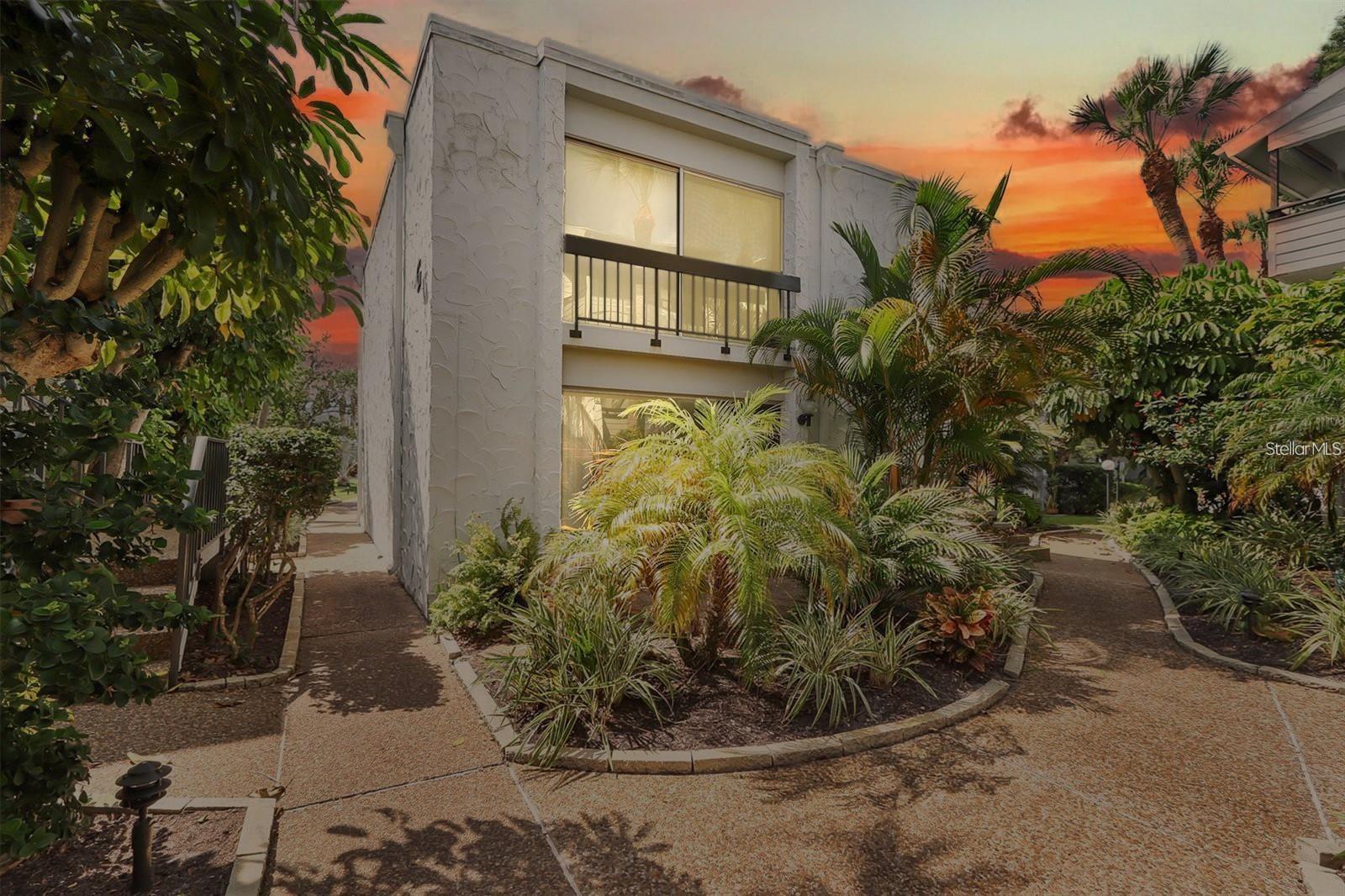 SELLER MOTIVATED! Owner financing available. Seller willing to pay 2026 condo fees at closing with accepted offer.  Welcome to this beautifully updated, "turnkey" gem located in the highly desirable beachfront community of Bahia Vista Gulf (BVG), one of the few 1st floor units in the area that didn’t experience flooding in 2024! Perfectly positioned on Venice Island, this stylish condo offers both modern updates and an unbeatable location. Step inside to discover a fully renovated interior, featuring laminate flooring, LED recessed lighting (2024), and a stunning Shiplap ceiling and accent wall (2024) that add a touch of elegance. The newly installed decorative ceiling fan (2024) creates a cozy atmosphere, while the floor-to-ceiling storage cabinets (2024) provide ample space for your belongings, along with 2 full closets and an additional 6' X 6' storage unit. The kitchen is a true showstopper with stone countertops, a stainless steel sink, and an updated Delta faucet (2024). Enjoy cooking with the latest appliances, including a Café 3-in-1 Air Fryer/Convection Oven/Microwave (2024), a cooktop induction stove (2024), and a sleek, brand-new refrigerator (2024). The updated backsplash (2024) ties it all together, creating a stylish, functional cooking space. The bathroom has also been tastefully updated in 2024 with quartz counters and a Flexstone shower/bath that exudes both luxury and practicality. You’ll also find an Equator ventless all-in-one washer/dryer, offering the convenience of laundry in the comfort of your own home. There is also a community laundry available for your convenience. Enjoy the outdoors on your private patio, featuring low-maintenance artificial turf with brick pavers underneath. The Miami-storm grade 3-sectional sliding glass doors (2024) open from both sides, creating a seamless flow from indoor to outdoor living. Additional features include matteblack accent hinges and door handles (2024), Ring Eufy entryway doorbell (2024), water heater (2021), and AC (2021), ensuring peace of mind and comfort. The BVG community offers boat dock slips on the canal side for lease on an annual basis (call for availability). A community pool that was completely renovated in 2025 adding to the value and appeal of this incredible property. You’ll be steps from the beach and the iconic Venice Jetties, offering breathtaking sunsets and world-class beach access. Take a short walk to Venice Ave, where you’ll find an array of shopping and dining options to enjoy year-round. If you love the beach life, this is the perfect opportunity to own a meticulously updated, flood-free condo in one of the most sought-after locations in Venice!