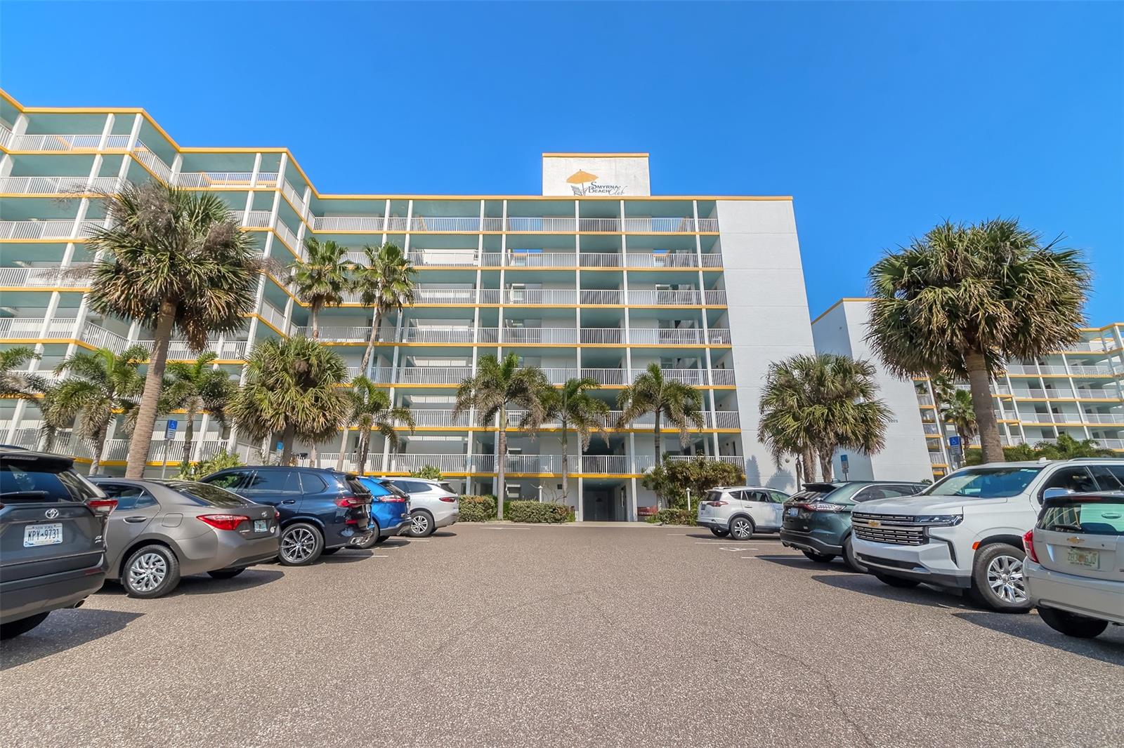 This direct Oceanfront corner unit will astound you with Captivating Ocean Views all around you. Completely remodeled and Impeccably maintained from top to bottom! Comes fully furnished; tastefully decorated with coastal decor. Added bunk beds in den area for extra guests. Kitchen boasts white wood shaker cabinets with soft close, Quartz countertops, large raised bar area, modern backsplash, and stainless steel appliance package. Plenty of room for entertaining or family gatherings in the open concept floorplan. Magnificent views everywhere you turn and tons of natural light. Relax by the pool and enjoy the Florida lifestyle with breathtaking sunrises and sunsets. Amenities include pool, tennis, BBQ grills, picnic area, shuffleboard and only steps to the Beach! Gaze out this corner units breakfast nook window while sipping on your morning coffee. Enjoy the lazy days of summer while fishing, boating, or just a day at the beach. Close to shopping, restaurants, many parks and special events . Come enjoy all that New Smyrna Beach has to offer. All information intended to be accurate, but cannot be guaranteed. ;Water: City
