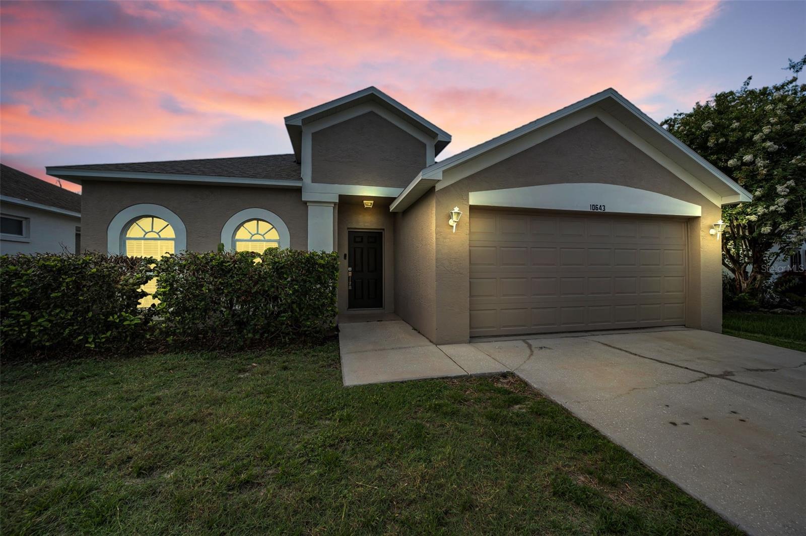 Welcome to this beautifully renovated 4-bedroom, 2-bathroom home located in the highly sought-after gated community of Fox Wood! Combining modern updates with a spacious, functional layout, this move-in-ready residence offers the perfect blend of comfort, style, and convenience.  From the moment you arrive, you'll appreciate the brand NEW ROOF, fresh NEW interior and exterior paint, and NEW front door.  Step inside to discover a light and bright floor plan featuring NEW luxury vinyl plank flooring throughout the formal living room, dining room, and bedrooms, complemented by ceramic tile flooring in the main living areas.  The heart of the home is the renovated kitchen, showcasing brand-new cabinetry, beautiful granite countertops, a pantry, stainless steel appliances, and a new dishwasher. The kitchen overlooks the spacious family room and large fenced backyard, creating the perfect setting for everyday living.  The private primary suite serves as a relaxing retreat, complete with a walk-in closet and an updated ensuite bath featuring a new vanity with granite countertop, dual sinks, a soaking tub, and a separate shower. Three additional bedrooms provide flexibility for family, guests, or a home office. Additional updates include some new lighting fixtures and numerous thoughtful improvements throughout the home. Outside, enjoy the large fenced yard with plenty of room for pets, play, or future outdoor enhancements. Conveniently located near top-rated schools, shopping, restaurants, medical facilities, golf courses and major commuting routes. This exceptional Fox Wood home offers everything today's buyers are looking for!