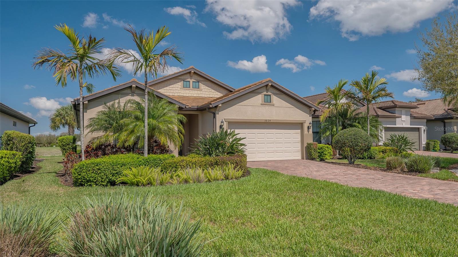 Virtually Staged. Lakefront Beauty in the maintenance free gated community of Hammock Preserve. This 3-bedroom 2 bath split plan with a den is ready for a new owner! Lovely water views from the living areas and primary bedroom. This open concept living area is enormous with flexible space to live like you do.  The primary bedroom is roomy with great views of the lake. The primary bath has a large walk-in shower with a built-in bench. The walk-in closet and linen closet provide plenty of storage. The kitchen features a large island with room to seat 4 and is open to the great room. Plenty of cabinets and a closet pantry make the kitchen function well.  The spacious screened lanai over looks the lake and fountain. The home has gas for the range, water heater and dryer. The den provides extra space for an office with double doors. The resort style community features a clubhouse, resort pool, fitness center, hot tub, fire pit, tennis, pickleball, dog park and bocce courts. Internet and lawn maintenance are included as well. Don’t miss this opportunity to enhance this home to make it your own. Home inspection, 4 point and wind mitigation are completed for a quick close...