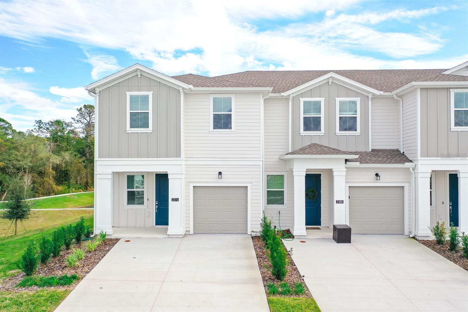 Amazing Brand-New Townhouse at Lake Wilson Reserve, just minutes away from DISNEY WOLD PARK ATTRACTIONS, and GATED community! This place is perfect for you, new cute corner property features 3 large bedrooms, 2.5 bathrooms, 1-Car Garage with VIEW LAKE. Natural light dances through the open living and dining areas, creating a warm and inviting atmosphere complemented by modern fixtures and finishes. A strategically placed half bath on the main floor ensures convenience, eliminating any morning rush-hour bottlenecks. Step outside into your private oasis a perfect spot for morning coffees or evening barbecues, all within reach of the enchantment of Disney. Open/split floor plan, the Floors Downstairs include tile on the floors. Kitchen appliances including a Modern stainless-steel appliance with Double Door Refrigerator, spacious stylish cabinets, and quartz countertops. Convenient breakfast bar perfect for fueling up before a day of Disney Adventures. All bedrooms are on the second floor and include carpet and are a good size. The master bedroom has a walk-in closet, a private bathroom, shower, double sinks, and modern finishes providing a relaxing retreat after a long day. The laundry is inside. Families will appreciate the proximity to top-rated schools, securing an excellent education. Beyond the home's comforts, the location offers easy access to local amenities, shopping centers, and dining options, with the added charm of being close to the magic of Walt Disney World. The allure of living near the iconic theme park adds an extra layer of enchantment to this already desirable property. As a new construction, this home boasts the latest in technology and design trends, ensuring high standards of quality and energy efficiency. Move-in ready, it invites you to be the first to make your mark on this pristine canvas. Situated in a well-planned community, the property not only offers proximity to Disney magic but also provides access to parks, walking trails, and recreational facilities, creating a lifestyle that extends beyond your doorstep. In summary, this townhouse isn't just a home; it's an opportunity to live amidst the magic of Disney in Kissimmee. With its contemporary design, prime location, and the promise of being the first to call it home, this property invites you to experience the perfect blend of modernity and enchantment. Don't miss the chance to make this magical haven yours. Schedule a viewing today and step into a world where modern living meets the enchantment of Disney in Kissimmee, FL. **Call today to schedule a showing*. Ready quick move-in!