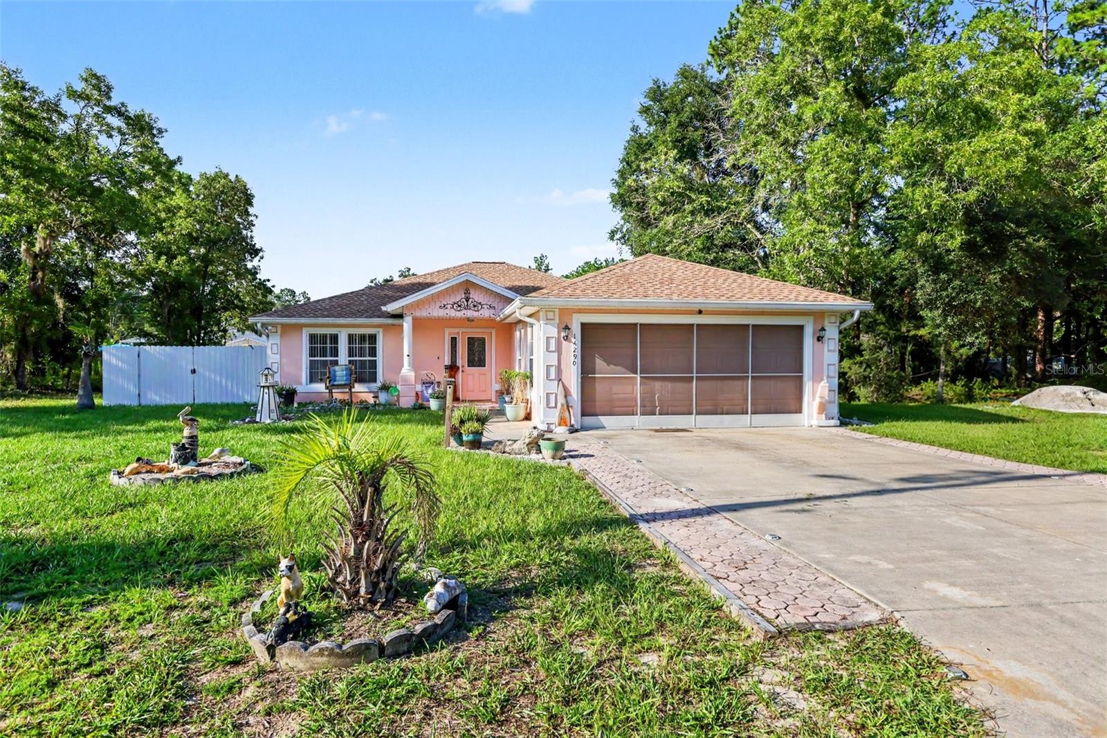 Unbeatable value meets total peace of mind in this beautifully updated 3-bedroom, 2-bathroom Rainbow Park home! This spacious 1,592 sq. ft. property delivers all the benefits of a new build without the premium price tag. Major high-ticket updates include a BRAND NEW ROOF (2025) and a NEW HVAC SYSTEM (less than a year old), ensuring effortless, low-maintenance living. Step inside to find a freshly modernized interior featuring an upgraded kitchen and baths, brand-new appliances, and plush new carpeting throughout. The desirable split floor plan offers an airy, open living area and an expansive primary suite with a walk-in closet. Situated on a lovely quarter-acre lot with a 2-car garage, you’re just minutes from Ocala’s premier dining, shopping, and natural springs. More space, modern upgrades, and zero work required schedule your tour before it’s gone!