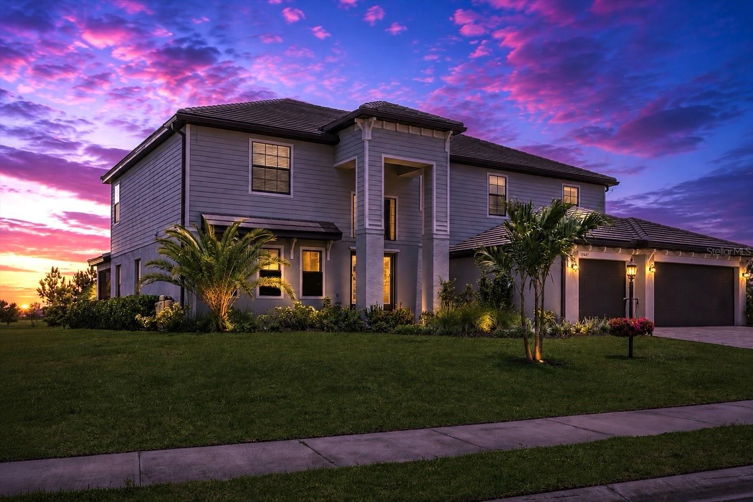 Welcome to 15347 Golden Beam Place, a rare opportunity to own the largest and most private homesite in the highly sought-after gated community of Lorraine Lakes at Lakewood Ranch. Situated at the end of a quiet cul-de-sac, this exceptional 5-bedroom, 4.5-bath home with a dedicated office offers over 4,000 square feet of thoughtfully designed living space, expansive lake views, spectacular sunset views, and no rear neighbors.

The highly desirable Wynwood floor plan is known for its open-concept design, featuring a massive great room where the kitchen, dining, and living areas flow seamlessly together. Oversized sliding glass doors fill the home with natural light and open to a large screened lanai overlooking the water, creating the perfect indoor-outdoor Florida lifestyle.

Designed for flexibility, the home features primary suites on both the main and upper levels, generously sized secondary bedrooms, an enormous upstairs bonus room, and a three-car garage with epoxy floors. With green space bordering the property and a homesite that feels nearly twice the size of many neighboring lots, this is a level of privacy and space rarely found in newer communities.

Residents enjoy resort-style amenities including pools, tennis and pickleball courts, fitness center, clubhouse, restaurant, splash park, and more. Conveniently located near top-rated schools, shopping, dining, and approximately 30 minutes from world-famous Gulf Coast beaches, this is one of Lorraine Lakes’ most exceptional offerings.