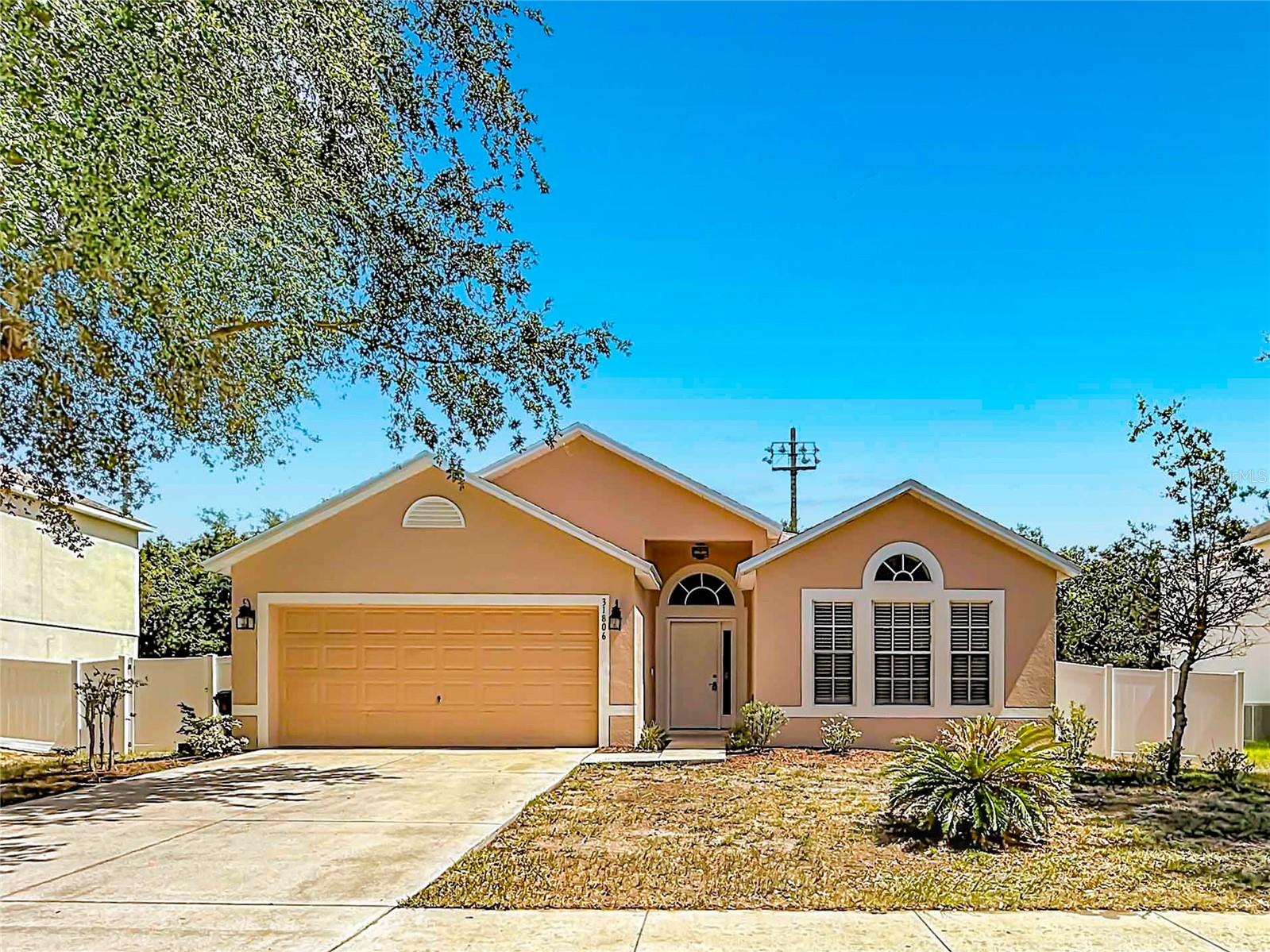 Beautifully Updated 4-Bedroom Home in a Prime Location! This spacious four-bedroom home offers exceptional value with a newer PVC privacy fence and new roof in 2023. Located near public access to the scenic Chain of Lakes, the home has been extensively remodeled and is move-in ready. Recent updates include updated cabinetry with granite countertops, new appliances, light fixtures, doors, and ceiling fans. The open floor plan includes formal living and dining areas, a spacious kitchen with breakfast nook, snack bar, granite countertops, tile backsplash, newer stainless appliances. The kitchen flows seamlessly into the family room and out to the patio, perfect for entertaining. The primary suite features a walk-in closet and an updated bath with dual sinks, a garden tub, and a new glass walk-in shower. Three additional bedrooms share a renovated guest bath. Located in a sidewalk-lined, family-friendly neighborhood, this beautifully updated home is ready for its new owners. Schedule your showing today!