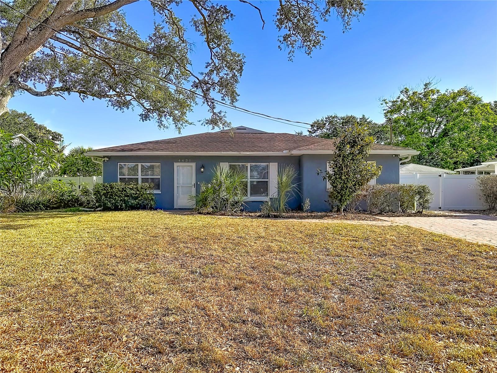 Virtually Staged. Discover your perfect retreat at 4431 W Bay Villa Ave in the heart of South Tampa's desirable neighborhood. This charming one-story, fully updated single-family home offers 1,473 square feet of comfortable living space with 3 bedrooms and 2 full bathrooms. Step inside to gorgeous wood-look laminate flooring that flows throughout the main living areas, complemented by warm wood flooring in the secondary bedrooms for a cozy, inviting feel.
The heart of the home shines with an updated kitchen featuring sleek granite counters and modern stainless steel appliances, ideal for preparing meals and entertaining. Adjacent is a spacious family room anchored by a wood-burning fireplace, creating the perfect spot for relaxing evenings or gathering with loved ones. Both bathrooms have been tastefully updated with contemporary finishes, adding to the home's move-in-ready appeal. Outside, enjoy a large vinyl-fenced rear yard complete with two storage sheds—plenty of room for outdoor play, gardening, or simply unwinding in your private oasis.
Located in a quiet, established South Tampa community, this home places you within easy reach of everything the area has to offer. Enjoy proximity to beautiful waterfront parks like Ballast Point Park for scenic views, fishing, and recreation. Tampa's vibrant downtown and iconic Tampa Riverwalk are just a short drive away, offering miles of scenic pathways, dining, museums, and cultural experiences along the Hillsborough River.
Within 20 miles, thrill-seekers can head to Busch Gardens Tampa Bay for world-class roller coasters and animal encounters, while families love The Florida Aquarium and ZooTampa at Lowry Park. History buffs will appreciate the Tampa Bay History Center, and art enthusiasts can explore the Tampa Museum of Art. Additional nearby destinations include Ybor City for its historic charm, vibrant nightlife, and dining; Sparkman Wharf for waterfront entertainment and food halls; and beautiful Gulf beaches like those in St. Petersburg or Clearwater, all within easy reach for day trips.
This updated gem combines modern comforts with unbeatable location convenience—schedule your showing today and make 4431 W Bay Villa Ave your new home!