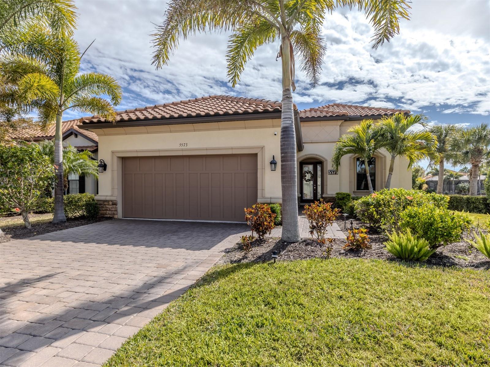 Discover this stunning coastal home in the wonderful Taylor Morrison community of Bellacina. You will enjoy the feeling of living on an island as this home is surrounded by lakes and a wildlife refuge pond with waterfowl, turtles and fish. And it is the backdrop to glorious sunsets from almost every room. The location is perfect; it is steps to the pathway to the terrific amenities.
The home is sunny and bright with natural light and colorful designs, luxury vinyl flooring throughout, impact windows, quartz countertops, large kitchen island and beautiful wall treatments. This home has 3bd/3 and ½ baths easily accommodating family and guests.
The 25 x 15 ft. salt pool and beautiful spa is custom designed and ready for laps, water games and just a lazy swim. The lanai area is spacious with a covered entertainment area, lounges, and a full outdoor kitchen all overlooking the lake.
Bellacina by Casey key is a gated community nestled on the west coast of Florida close to renowned beaches like Siesta Key, Casey Key, Nokomis and Venice. This desirable property is just a 12-minute drive to the ever-popular downtown area of Venice with restaurants, shopping and sightseeing, 30 minutes to downtown Sarasota known for the Ringling complex, Van Wezel Performing Arts, SRQ Symphony and famous Selby Gardens, multiple dinner theaters and a host of other cultural events. Just over a bridge is St. Armands Circle with exquisite shopping, great food and access to Lido Beach and Long Boat Key.
Bellacina has attractions of its own. The clubhouse offers social events, social clubs, and houses the fitness center. There is a luxury resort pool with cabanas, umbrellas, water classes, an adjacent spa and an outdoor grill.
For the sporting residents and guests there are Har Tru lighted tennis and pickleball courts, bocce and corn hole courts, a playground, and walking paths throughout the beautiful community. Attention-Bellacina has a private entrance to the Legacy Trail!
Bellacina will be a home for unforgettable memories, a place to make lasting friends and a convenient way to have a sun and experience filled life on the gorgeous west coast of Florida.
Schedule a private showing today.