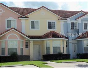 BIG OPPORTUNITY! VACATION HOME!! SHORT AND LONG RENTALS PRICE TO SELL!! “Where Resort Living Meets Smart Investment” GATED COMMUNITY - RESORT TYPE - FULL AMENITIES!! GREAT CONDITION! Semi- furnished townhouse in the exclusive Fiesta Key gated resort community. This 2-story residence offers 3 bedrooms, 2.5 baths, and a private screened lanai with tranquil pond views. Approved for short-term and long-term rentals, or ideal as a primary or second home. The open-concept first floor features ceramic tile throughout, a fully equipped kitchen with stainless steel appliances, breakfast bar, and seamless flow into the dining and living areas. Sliding glass doors open to the screened patio, perfect for relaxation and entertaining. Upstairs, the primary suite includes a walk-in closet and en-suite bath, with two additional bedrooms sharing a full bath. Resort-style amenities include a lagoon pool, tennis courts, fitness center, and clubhouse. The property includes two assigned parking spaces. Prime location just minutes from Walt Disney World, Universal Studios, major highways, shopping, dining, and Orlando International Airport. Recent upgrades: New A/C (08/2023); washer and dryer (02/2024). Turnkey, move-in ready, and an excellent income-producing opportunity. Owner motivated.Nice unit