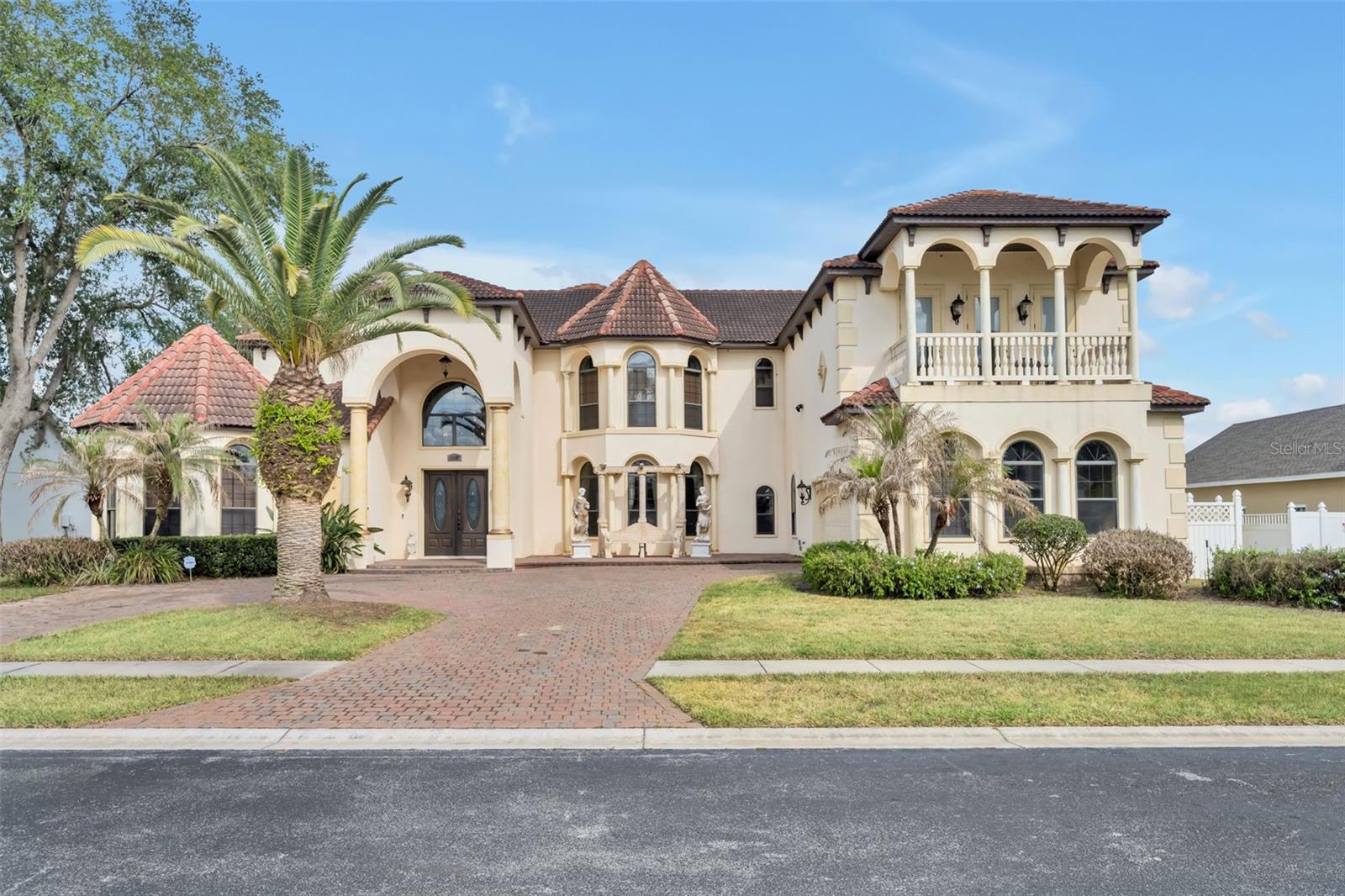 Exquisite Lakefront Luxury Estate in Formosa Gardens on Star Lake

Welcome to an extraordinary, turnkey Mediterranean estate perfectly positioned on the shores of Star Lake in the Formosa Gardens community. Just minutes from Walt Disney World, Universal Studios Florida, and SeaWorld Orlando, this remarkable residence offers the ultimate blend of luxury, comfort, and convenience.  

This custom-built, high performance vacation rental has been the center showcase for many stunning weddings and corporate retreats, is lavishly furnished home features 9 spacious bedrooms and 10 bathrooms, each bedroom designed as a private suite with its own beautifully appointed bath. From the moment you enter, you are greeted by a grand staircase and elegant architectural details that set the tone for this impressive estate—perfectly suited for luxury living, corporate retreats, or large family gatherings.

At the heart of the home is a chef-inspired gourmet kitchen complete with a gas stove, granite countertops, and custom cabinetry, seamlessly flowing into expansive living and entertaining spaces. The home is thoughtfully equipped with high-end amenities including a baby grand piano, upgraded smart TVs, a private fitness area, arcade game, slate pool table, projection theater setup, and a dedicated wine room.

Step outside to your private resort-style oasis where an infinity-edge pool appears to merge into the tranquil waters of Star Lake. The screened lanai and second-floor deck provide breathtaking, unobstructed views—perfect for enjoying Florida sunsets and even Disney fireworks in the distance. Outdoor living is elevated with a fully equipped summer kitchen, gas grill, bar area, and lounge spaces designed for entertaining day or night.

With its unmatched location, exceptional design, and extensive amenities, this one-of-a-kind lakefront estate offers a rare opportunity to own a true Central Florida luxury retreat.

Experience it in person—this is a home that must be seen to be fully appreciated