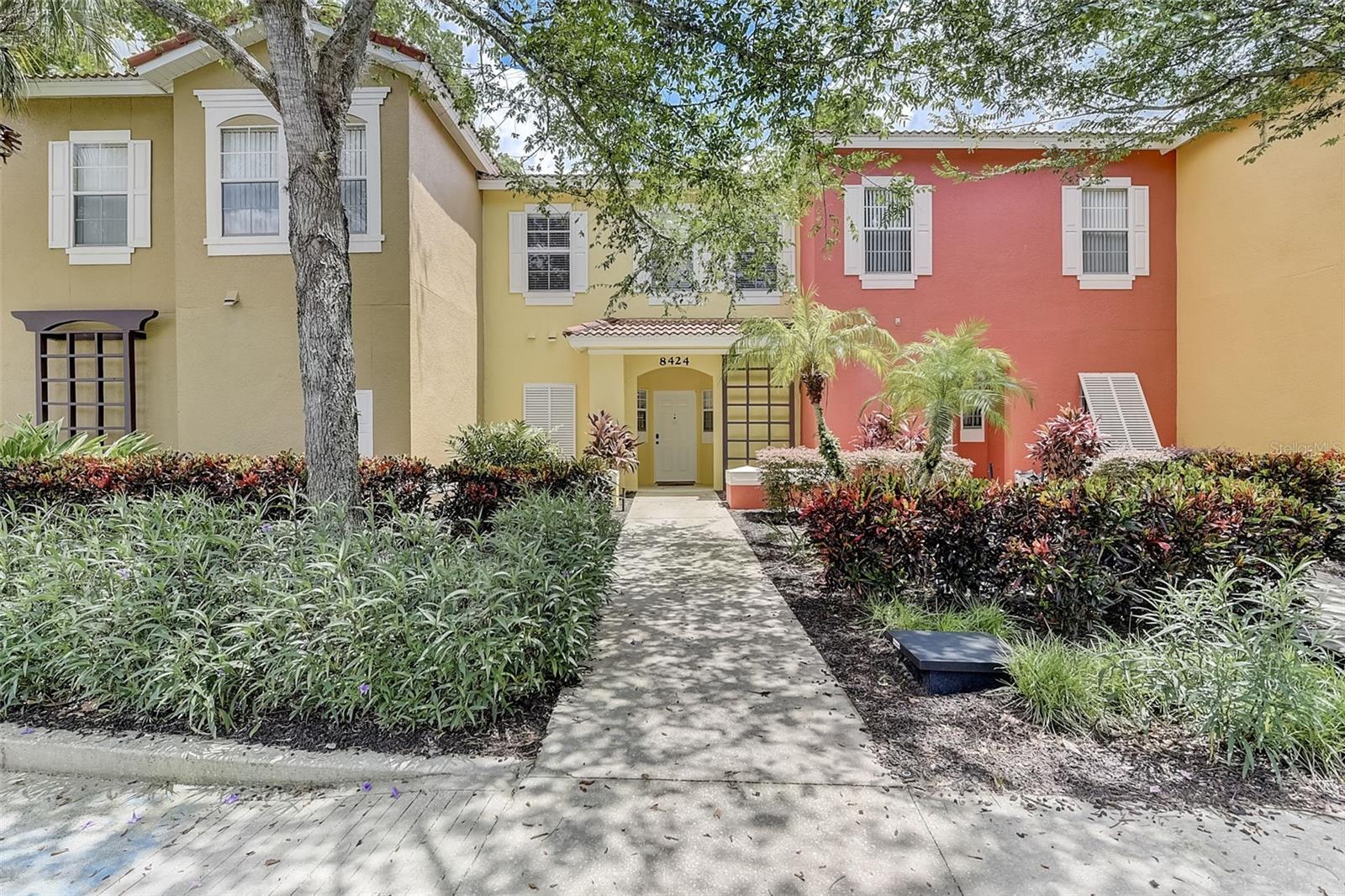 Your vacation home in the heart of the theme park awaits! Take a look at this fantastic 3-bedroom/2.5 bath townhome located in the sought after area for short term rental at Emerald Island Resort Community. This home is being sold fully furnished and move-in ready. The home has been part of a short-term rental program but would also make a perfect single-family home or vacation home. The first floor features an open living space that includes a kitchen, dining room, and large living room with sliding doors to the covered patio. A half bath and laundry room are also located on the first floor for convenience and ceramic tile flooring throughout the main floor makes for easy maintenance. All bedrooms are located upstairs including the master suite which features an adjoining bathroom with a private bathroom and a balcony. A ground floor WC, completes this well-planned home. This property is absolutely perfect for anyone that enjoys resort life. Emerald Island has fantastic amenities, Community Pool, Community fitness center, Spa, Games Room, Tiki Bar at the Main Pool area, Woodland Walks and trails, Basketball Courts, Tennis Courts, conveniently close to the Disney attractions, Margaritaville, Island H2O water park, shopping, restaurants and dining.