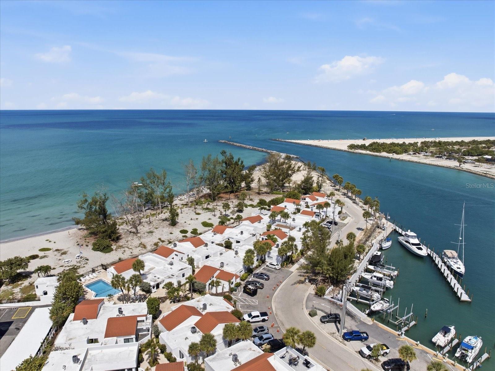 Welcome to Jetty Villas, a Mediterranean-inspired beachfront condominium community uniquely positioned on the Gulf of Mexico and surrounded by the scenic Venice Jetty and Intracoastal Waterway. Ideally located near marina activity, waterfront dining, boating, and Venice’s coastal attractions, this beautifully renovated first-floor 2-bedroom, 2-bath residence offers 1,049 square feet of relaxed waterfront living with Gulf views, three private lanais, and direct beach access just outside your door.

Inside, the condo has been thoughtfully updated with a redesigned kitchen featuring quartz countertops, custom cabinetry, and stainless steel appliances including a range, refrigerator, and dishwasher. Renovated bathrooms and refreshed interior finishes create a clean, polished, move-in-ready feel throughout.

Outdoor living is a standout feature of this residence. The main living area lanai captures Gulf views and opens toward the beach, while the guest bedroom also enjoys peaceful water views. The private lanai off the primary suite provides a quiet outdoor retreat perfect for morning coffee or relaxing sunset evenings with coastal breezes.

Jetty Villas residents enjoy a community pool, assigned parking, guest parking, and the condo fee includes cable TV, internet, water, sewer, trash, exterior and grounds maintenance, common area insurance, reserves, pest control, pool maintenance, repairs, and professional management — allowing for effortless Gulf Coast living in one of Venice’s most unique waterfront settings.




All information is deemed reliable, buyer and buyer's agent to verify all measurements, facts, information, and dimensions.