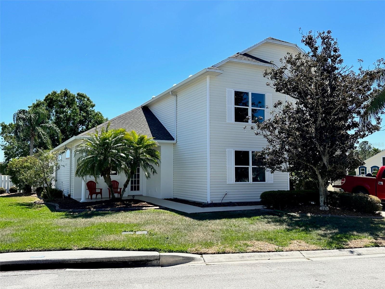 If you don't want to wait to have a home built and would like to step into a brand-new build, then this is the home for you.  The home has been stripped down and refurbished for a brand-new fresh look.  All of the floors, bathrooms, bedrooms and the kitchen have been rebuilt with exquisite taste.  The roof was replaced in 2018, the windows have all been replaced with energy efficient double pane windows.  The flooring throughout the living area is a luxury plank vinyl flooring.  All bedrooms are freshly carpeted, and all bathrooms tiled.  There is a shop just off of the carport that is perfect for woodworking or any other hobby you might have.  Get a jump start on the first viewing by appointment. This property sits on a corner in the sought after community of Mt. Olive Shores North.  A 55+ community with plenty of activities to keep you as busy as you would like. Featuring two clubhouses, pickleball courts, shuffleboard and a social committee for all other activities.