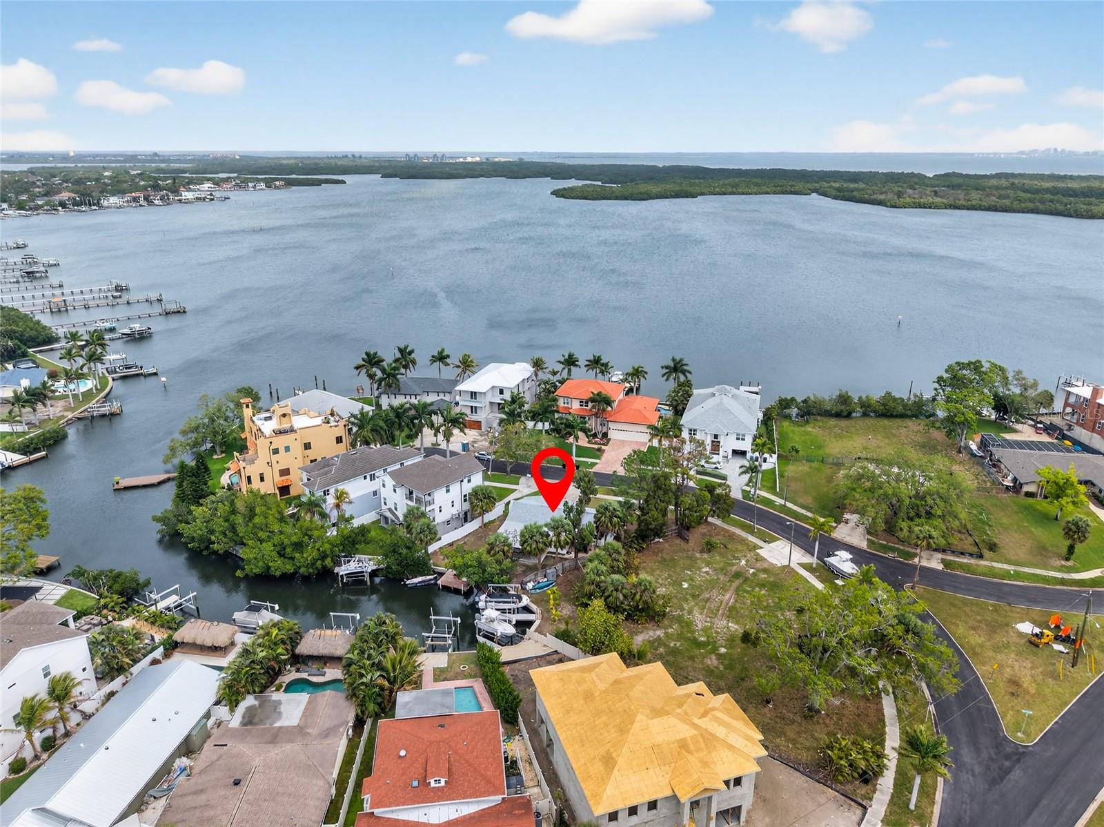 Imagine waking up, stepping outside, and being on the water with a direct shot to OPEN TAMPA BAY. No bridges, no waiting, no limits. That is the reality of this rare waterfront opportunity in the peninsula community of Shore Acres.

Positioned on a 74x117 ft lot with 59 feet of direct canal frontage and NO BRIDGE RESTRICTIONS to Tampa Bay, this property presents an exceptional opportunity to create the custom waterfront lifestyle you’ve always envisioned. Whether imagining a sleek modern coastal design or a timeless waterfront retreat, this homesite offers the boating access, water views, and location buyers search for and rarely find.

The existing structure is being sold strictly for LAND VALUE and redevelopment opportunity only, giving the next owner the freedom to reimagine the property to suit their vision. Picture expansive outdoor living spaces, a resort-style pool, private dockage, and effortless access to Tampa Bay and the Gulf beyond.

Located just minutes from vibrant downtown St. Petersburg, you’ll enjoy convenient access to the St. Pete Pier, award-winning restaurants, museums, waterfront parks, marinas, nightlife, and the city’s thriving arts scene, while still enjoying the privacy and serenity of waterfront living. Nearby amenities include the new Speer YMCA, Shore Acres Recreation Center, Weedon Island Preserve, Mangrove Bay Golf Course, Cypress Links, Whole Foods, Publix, Trader Joe’s, and easy access to I-275 and Tampa International Airport.

Opportunities like this are becoming increasingly rare in Northeast St. Petersburg. The waterfront location is here. The vision is yours.
