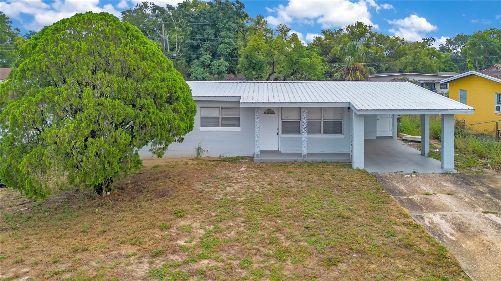 Welcome to this charming Orlando home with a NEW METAL ROOF - 2026 offering an excellent opportunity for first-time buyers, investors, or anyone seeking affordable Central Florida living. Situated on a spacious lot, this solid concrete block residence features 3 bedrooms and 1.5 bathrooms with a functional floor plan designed for comfortable everyday living.

The home offers a bright living area, NEW kitchen appliances and a generously sized backyard with plenty of room for outdoor entertaining, gardening, pets, or future enhancements. The kA covered carport provides convenient parking and additional storage options.

Conveniently located just minutes from major roadways, shopping, dining, schools, and Orlando's world-famous attractions, this property combines accessibility with neighborhood charm. Whether you're looking for a primary residence or an investment property, this home presents outstanding potential and value.

Don't miss your chance to own a piece of Orlando real estate with easy access to downtown Orlando, area theme parks, and everything Central Florida has to offer.