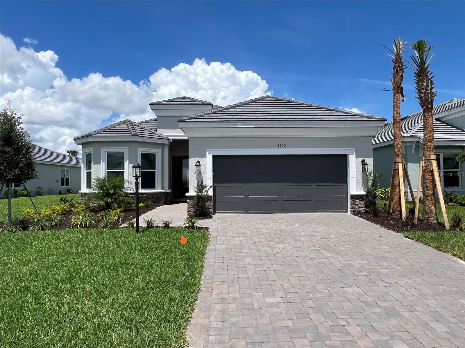Under Construction. What's Special: Pool Included | Gourmet Kitchen | No Rear Neighbors | Covered Extended Lanai. New Construction - June Completion! Built by America's Most Trusted Home Builder. Welcome to the Lazio at 3302 Vicenza Court in Esplanade at Azario Lakewood Ranch! This stunning new home offers a bright and open layout designed for easy, comfortable living. Whole house impact windows and luxury vinyl plank flooring throughout the main living area and primary suite create a stylish and welcoming foundation. The gourmet kitchen features shaker cabinets, quartz countertops, a walk-in pantry, and a center island overlooking the dining room, great room, and casual dining area. Sliding doors lead to the extended lanai with a private pool, perfect for enjoying the Florida sunshine. The exquisite primary suite with a bay window is tucked at the back of the home and includes an en-suite bath and a spacious walk-in closet. A secondary bedroom, full bath, and dedicated study sit near the foyer, while another secondary bedroom with an en-suite bath, the laundry room, and the two-car tandem garage entry are thoughtfully placed on the opposite side. Additional Highlights Include: Private pool, gourmet kitchen, casual dining extension, extended lanai, bay window at primary bed, study in place of flex, extended lanai, tandem garage, tray ceiling package, and 8' interior doors. Photos are for representative purposes only. MLS#A4685867 - Resort-Style Living in Esplanade at Azario Lakewood Ranch, the perfect blend of relaxation and recreation! Enjoy the heated resort-style pool, state-of-the-art fitness center, and energizing aerobics classes. For outdoor enthusiasts, there are pickleball courts, scenic trails, Vitality Park, and if golf is your game, you'll love Esplanade's 18-hole championship course! Unwind with a facial massage or by the fire pit after a workout. Exclusive amenities like a Wellness Center, Culinary Center, and sports courts ensure there's something for everyone, whether you want to stay active or relax in style.