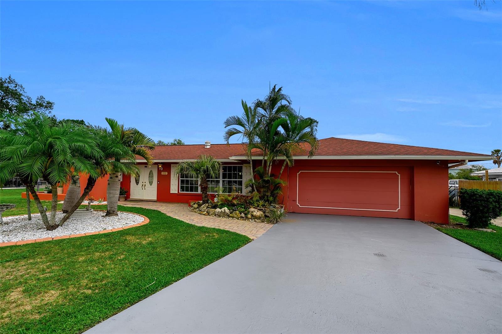 Welcome to waterfront living in Highland Shores, where boating, relaxation, and modern comfort come together. Perfectly positioned on a canal with access to the Manatee River, this beautifully renovated 4-bedroom, 4-bath residence offers the quintessential Florida lifestyle with room to spread out both inside and out.
Situated on an expansive .44-acre lot with no HOA, the property is ideal for those who love life on the water. In addition to its waterfront setting, the property features extended parking with RV hookup, providing plenty of space for your recreational vehicles, boat trailer & outdoor toys. Spend your days exploring the river, fishing from your backyard, enjoying sunset cruises, or launching from the community boat ramp just moments away.
Inside, the home has been thoughtfully transformed with stylish, modern finishes throughout. The heart of the home is the stunning chef-inspired kitchen, featuring an impressive 5' x 12' quartz island accented with gray cabinetry, contrasting white shaker cabinets with soft-close doors and drawers, and a sleek stainless-steel range hood that creates a striking focal point. Wood-look plank ceramic tile flooring flows throughout the living areas, while crown molding adds an elegant finishing touch.
The beautifully renovated bathrooms, updated interior doors, newer windows, 2019 roof, dual A/C systems (2018 & 2020) & water heater 2025 further enhance the home's move-in-ready appeal. At the center of the home is a rare indoor pool, offering year-round enjoyment and a private resort-style atmosphere. All three bedrooms feature sliding glass doors that open directly to the pool area, creating a unique & inviting retreat just steps from your bedroom. 
Adding exceptional flexibility, one bedroom and bathroom with its own private entrance providing the perfect space for guests, extended family, a home office, or a quiet retreat.
Whether you're an avid boater, an entertainer at heart, or simply searching for a peaceful waterfront escape, this exceptional Highland Shores property offers a rare opportunity to enjoy the best of Florida living with modern updates, generous outdoor space, and direct access to the boating lifestyle you've been dreaming of.