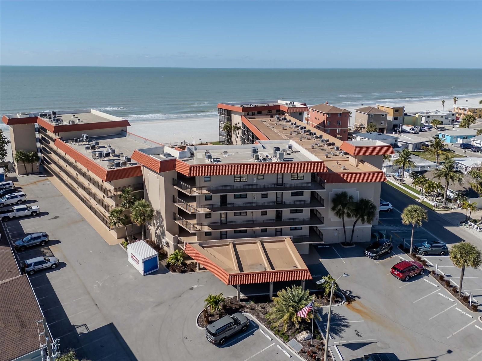 Stunning Gulf-Front Corner Residence | Top-Floor 2BR/2BA in Redington Shores
Welcome to Unit 403 at Gulf Mariner Condominiums—an exceptional top-floor, corner 2-bedroom, 2-bath residence offering views of the Gulf of America. This home delivers beach and sunset views.
This residence creates a peaceful and modern coastal retreat. The kitchen showcases newer cabinets and countertops with contemporary look. Appliances include a dishwasher, range, oversized sink with ample room for a bistro table. It opens up to the formal dining and living room. All this overlooks the screened patio with great view of Gulf. It is the perfect blend of  indoor-outdoor living and enjoying the sea breeze.