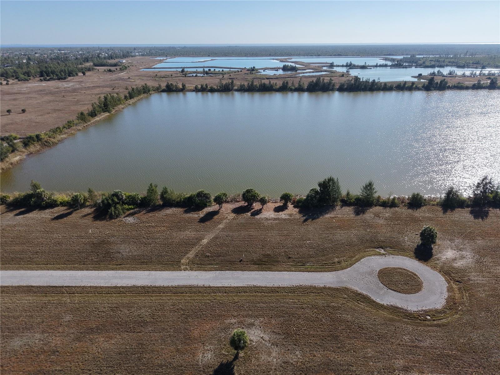 Discover the coastal charm and relaxed Florida lifestyle waiting for you at 8 Chinaberry Way in beautiful Placida, FL 33946. Lot cleared and ready for your vision, this exceptional property is located in a serene and desirable community, placing you just moments from the sparkling waters of the Gulf of Mexico, world class fishing, boating adventures, and the pristine beaches of Boca Grande.

Imagine morning walks beneath swaying palms, afternoons exploring nearby marinas and golf courses, and evenings enjoying breathtaking sunsets that paint the sky in brilliant coastal hues. With convenient access to shopping, dining, and endless outdoor recreation, this address offers the perfect balance of peaceful surroundings and everyday convenience.

Whether you are envisioning a seasonal retreat or your forever Florida escape, this Placida property provides the ideal setting to build and embrace the laid back Southwest Florida lifestyle.

Do not miss your opportunity to make this slice of paradise your own. Schedule your private showing today.
