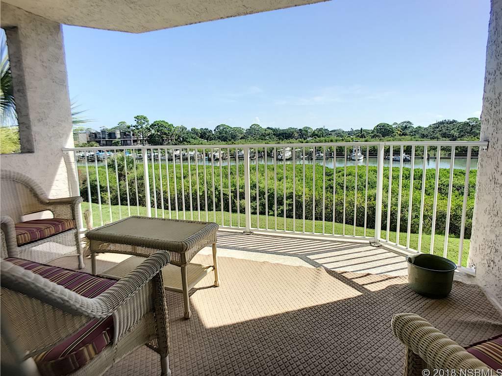 BEAUTIFUL VIEWS OF CALLALISA CREEK & more.  Enjoy Sunrise & your morning coffee from your Terrace.  Spacious corner condo with big  windows that allows natural light into this 3/3 condo.Enter into a tiled Lani leading to a Large Dining Area & Living Room each having peaceful views of the outside. The  Master Bedroom is bright & offers tranquil views from every location in the room.  Each room has its own bathroom & walk in closet. PRIVATE GARAGE #16, INCLUDED. This condo is freshly painted, has Bamboo flooring in the dining room and living room & newer carpet in the bedrooms. Super clean and Ready for you to move into.  BOUCHELLE ISLAND COMMUNITY OFFERS INTRACOASTAL VIEWS OF SUNSETS, DOLPHINS, BOATING, THE NSB ANNUAL CHRISTMAS PARADE, 4TH OF JULY CELEBRATIONS & MORE.  WALK THE 1/2 MILE RIVERFRONT PROMENADE, LAUNCH YOUR BOAT OR KAYAK, SWIM IN THE HEATED POOLS. PLAY CHIP & PUT GOLF & TENNIS & MEET YOUR FRIENDLY NEIGHBORS. WET SLIPS  RENTAL.  A WONDERFUL COMMUNITY WITHIN WALKING DISTANCE TO RESTAURANTS, FLAGLER AV & CANAL ST EVENTS, SHOPPINGS & OUR WONDERFUL ATLANTIC OCEAN!Owners do not wear shoes in this home.  Some of the furniture is negotiable. Hurricane covers in garage. ;Water: City