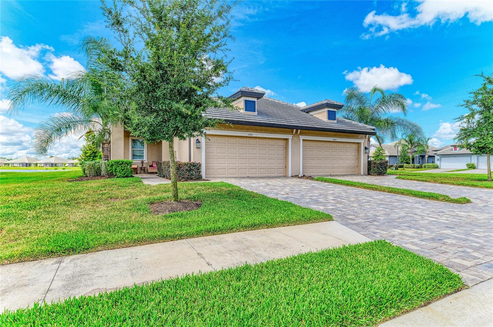 Looking for a low-maintenance home that offers comfort, convenience, and modern style? This beautifully designed Topaz villa checks all the boxes.

Featuring 2 bedrooms, 2 bathrooms, a versatile den, and a spacious 2-car garage, this thoughtfully designed floor plan provides the flexibility today's buyers want. Whether you need a home office, hobby room, or cozy reading retreat, the bright front den offers endless possibilities.

At the heart of the home, you'll find an open-concept kitchen with a large center island, abundant cabinetry, generous countertop space, and a pantry for extra storage—perfect for everyday living and entertaining. The kitchen flows seamlessly into the dining area and spacious great room, creating an inviting space for gathering with family and friends.

Large sliding glass doors fill the home with natural light and lead to the covered lanai, offering the ideal spot to relax, dine outdoors, or enjoy Florida's beautiful weather year-round.

The private owner's suite provides a peaceful retreat featuring dual vanities, a walk-in shower, and a spacious walk-in closet. A separate guest bedroom and full bath offer comfort and privacy for visitors.

Additional highlights include a large utility room with extra storage space and select furniture that may convey, making your move even easier.

Located in the desirable Sweetwater Villas community, residents enjoy a prime location just off the newly opened 44th Avenue East bridge, providing quicker access to shopping, dining, major roadways, employment centers, top-rated schools, and the stunning Gulf Coast beaches.

If you're seeking a move-in-ready villa with modern finishes, flexible living space, and a convenient location, this home is a must-see. Schedule your private showing today!