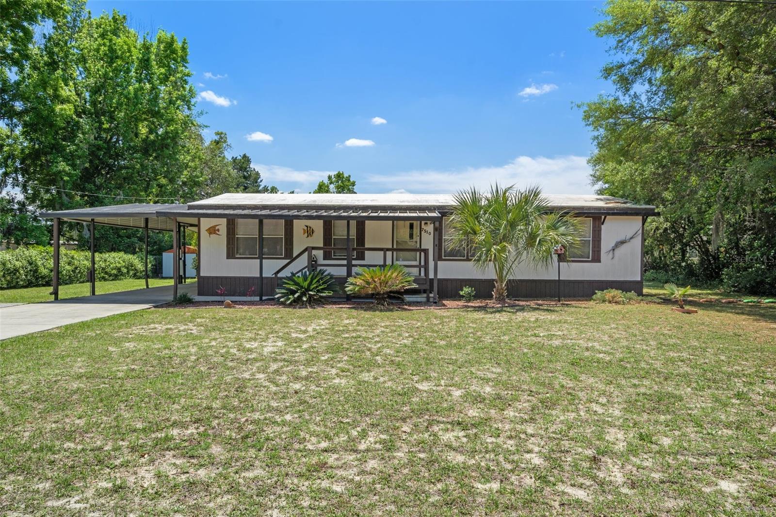 Welcome home to this charming 3-bedroom, 2-bathroom double wide mobile home nestled in the heart of Homosassa! Built in 1985, this inviting home features an updated kitchen, updated bathrooms, providing a fresh, modern feel throughout. This well-maintained property offers comfortable living with the added peace of mind of a brand-new septic system and drainfield, 2021 HVAC system, a membrane roof installed in 2015 with years of expected life remaining. Situated in zone "x" of FEMA flood guidelines of the State of Florida, this cute home features a covered carport, RV parking, and a storage shed, providing plenty of room for tools, lawn equipment, or extra storage. Whether you're looking for a primary residence, seasonal getaway, or investment property offers affordability and functionality in a convenient location near local springs, boating, fishing, shopping and dining. Don't miss your opportunity to make this Homosassa gem your own! Schedule your showing today!!