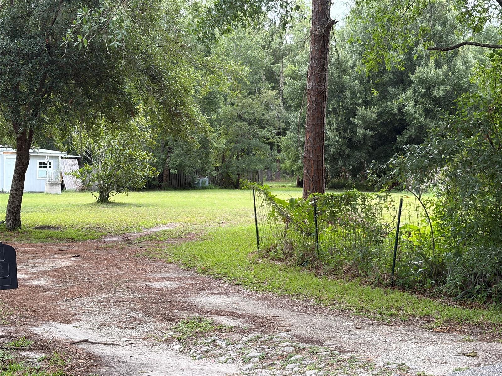 READY-TO-BUILD: 1.13-Acre Lot with Utilities on Site in Wesley Chapel! The true value is in the land! Located at 6900 Angus Valley Dr, this premium 1.13-acre, AR-zoned lot has NO HOA or CDD. It is the perfect opportunity for builders, investors, or anyone looking to construct a custom dream home in a highly desirable, fast-growing area. Skip the expensive impact fees and utility delays. Because there is an existing footprint, a buyer may save thousands of dollars on Pasco County impact fees while completely avoiding utility wait times. This property comes fully equipped with public water, electricity, and a septic system already on-site, saving you both time and money. KEY PROPERTY FEATURES: * Acreage: 1.13 cleared acres featuring a peaceful, private tree-line view. * Utilities: On-site public water, electric hookups, and existing septic system. * Location: Tucked away on a quiet, low-traffic road in the heart of Wesley Chapel. * Zoning Perks: AR (Agricultural-Residential) zoning offers incredible flexibility for your build. * Bonus: Existing structural footprint provides massive impact fee credit potential. Please Note: There is an existing mobile home on the property that is a complete tear-down. The property is being sold strictly AS-IS. The seller will not remove any structures, personal property, or debris. Bring your builder and your floor plans—premium acreage with utilities already in place disappears quickly in Wesley Chapel! Schedule your viewing today.