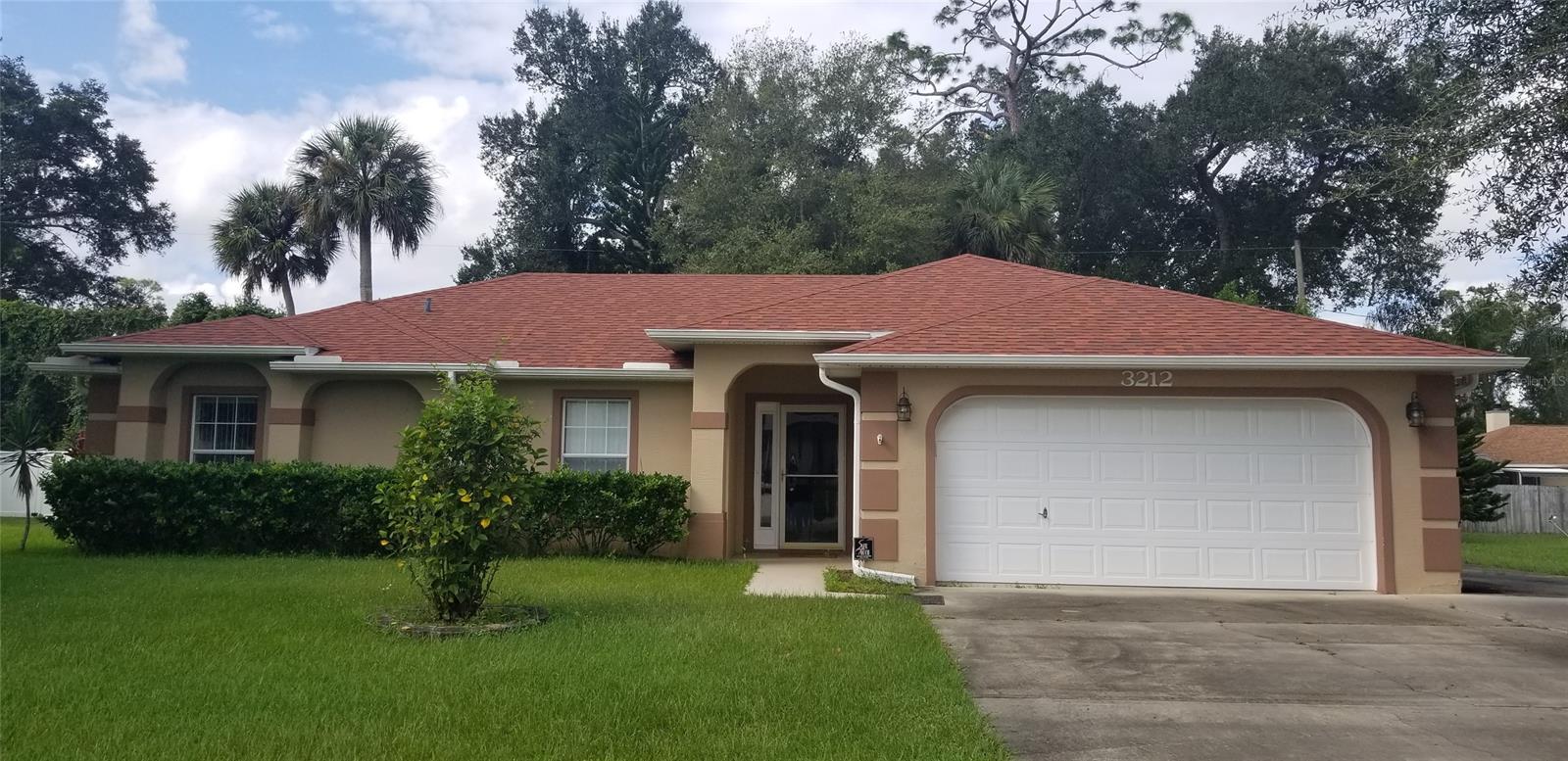 Well maintained Block construction home built in 2004 on a 120'x125' property.  New Roof installed with architectural shingles in 2017, A/C replaced in 2016. Updated kitchen in 2016, with laminate flooring. Kithchen has an eat in breakfast nook. New carpet installed in living room and bedrooms. Lots of interior living space including large enclosed Florida room overlooking beautiful large back yard. This home is move in ready!
Close to shopping, schools and Whistle Stop Park. ;Water: City