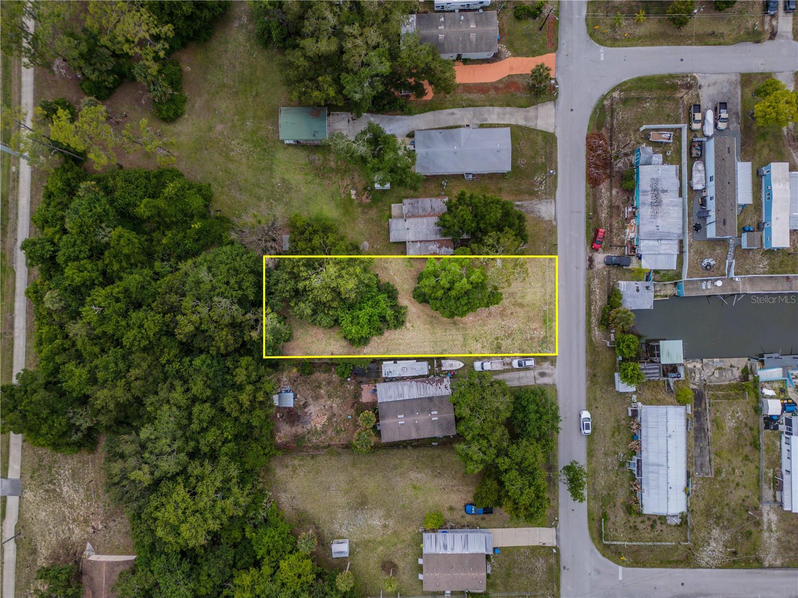 Tucked within the charming waterfront community of South Waterfront Park, this oversized 60x185 homesite on Nellie Street offers the perfect opportunity to bring your Florida dream to life. While the property does not have direct water access, it captures stunning canal-to-river views that create the peaceful waterfront atmosphere buyers are searching for ????

Whether you’re envisioning a cozy retirement retreat, a seasonal snowbird escape, your very first home, or an income-producing investment property, this versatile lot provides endless possibilities. Build to suit and design exactly what fits your lifestyle — from a modern coastal cottage to the ultimate laid-back Florida getaway.

Enjoy the convenience of being just minutes from shopping, dining, parks, boat ramps, and some of Florida’s most beautiful beaches. Residents of South Waterfront Park also enjoy access to the community clubhouse with an incredibly low HOA fee of only $25 per year.

Rarely do opportunities like this come along at such an affordable value. Let your imagination run wild and start building your future in one of Edgewater’s hidden gems.
